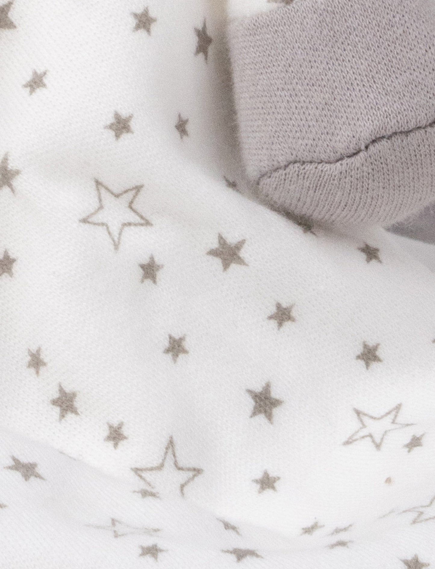 Soft baby blanket with a plush bunny head, long gray ears, and a white star-patterned fabric.
