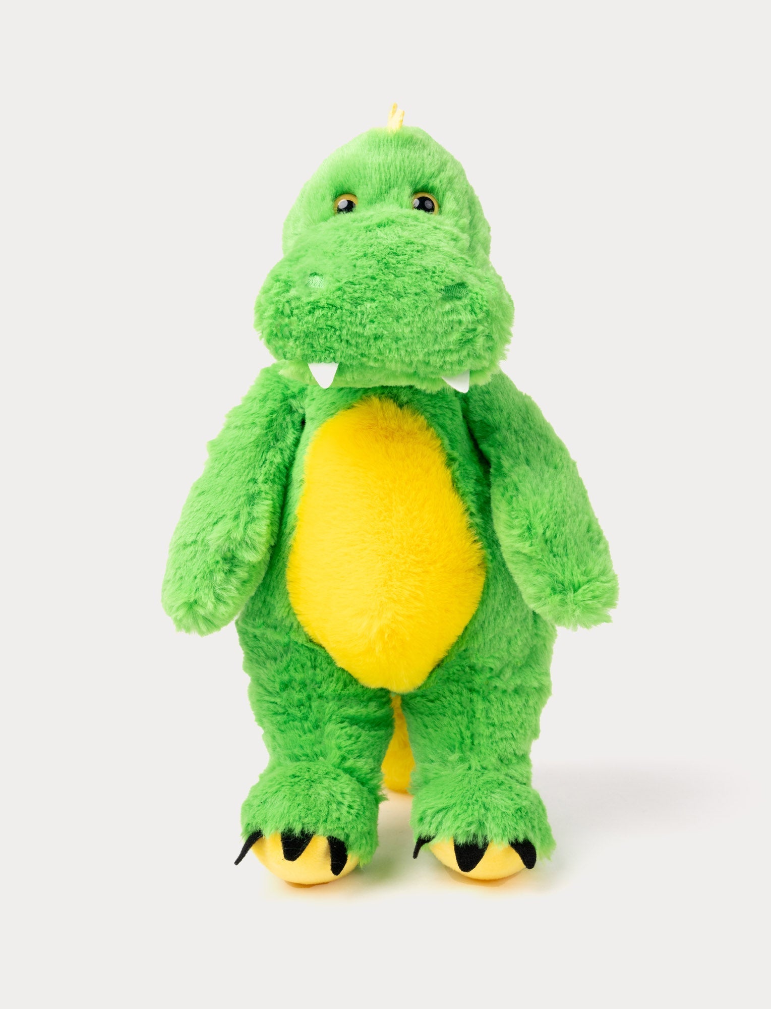  Image of Green plush dinosaur with a yellow belly, soft fur, small white teeth, and black claws on its feet.