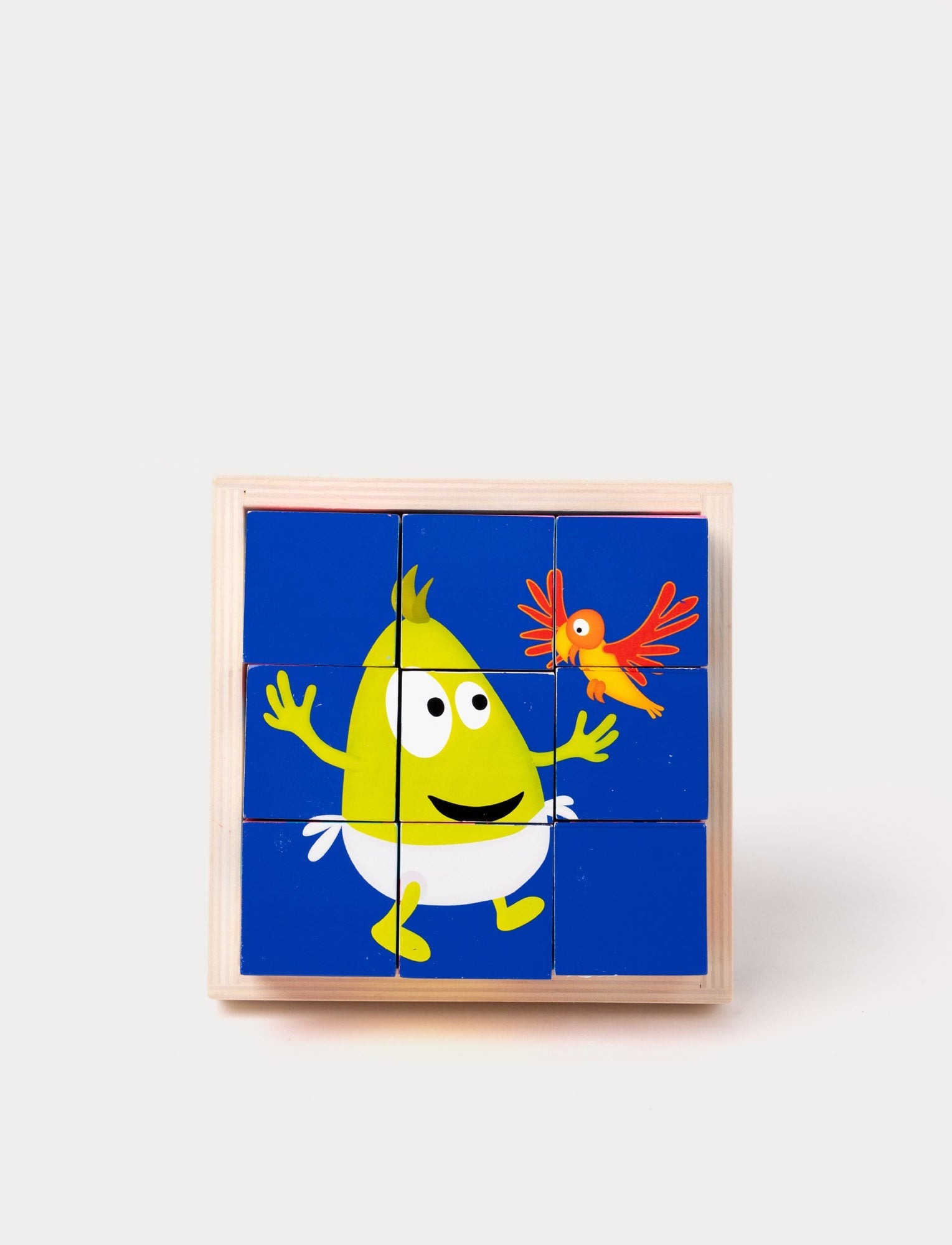  Image of Colorful wooden block puzzle with 9 pieces, featuring Babblarna characters in vibrant illustrations, with a tray for storage.