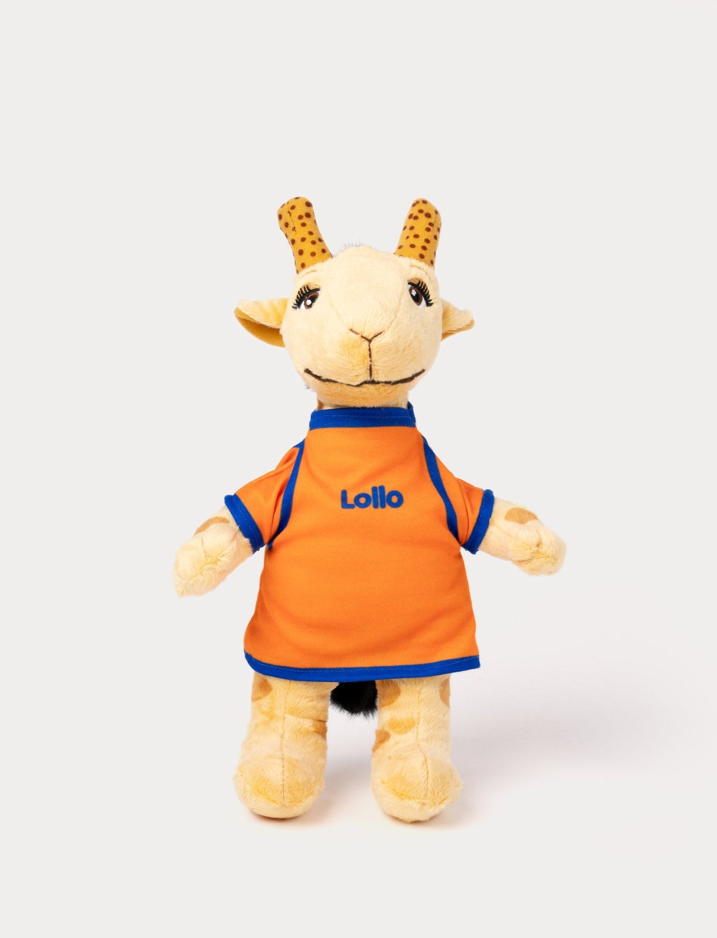 A plush toy of Lollo the giraffe wearing an orange and blue outfit with her name embroidered on it.