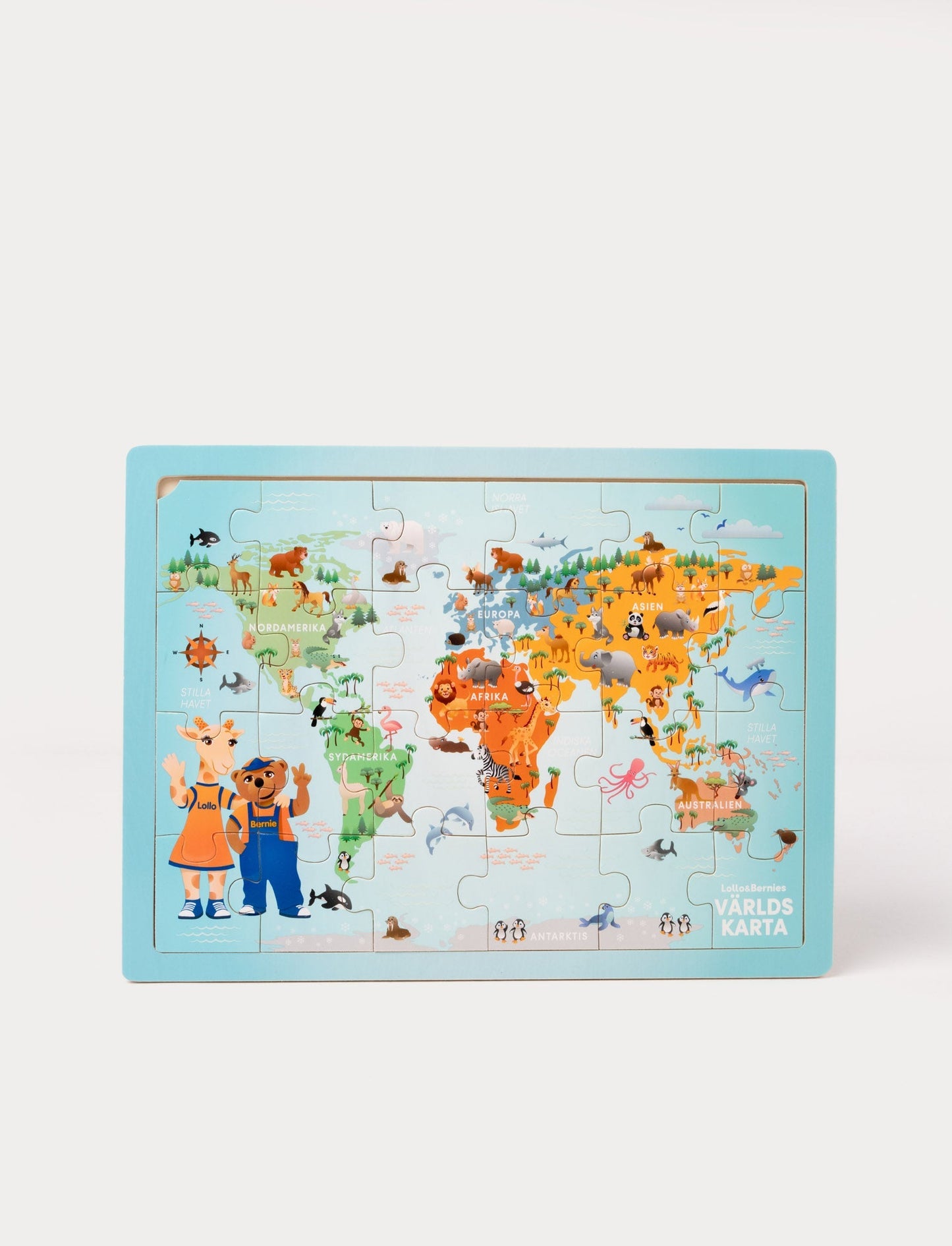 A colorful world map puzzle featuring Lollo and Bernie, with animals representing different continents.