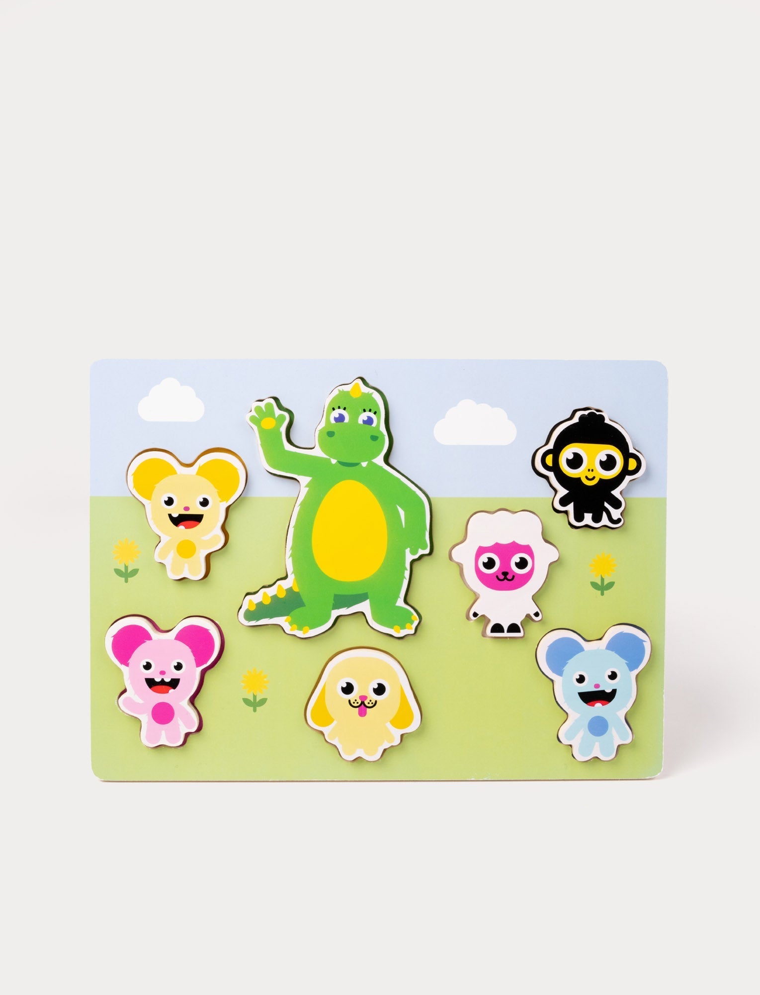  Image of A wooden puzzle featuring the Bolibompa dragon and colorful animal characters on a grassy background.