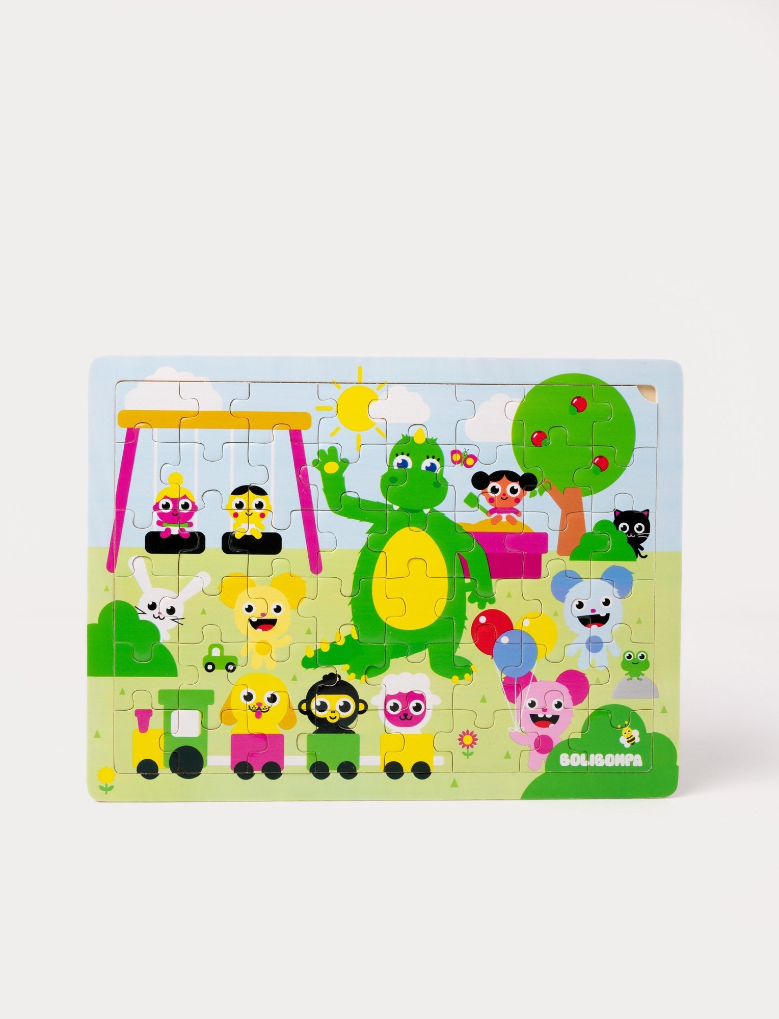  Image of A colorful Bolibompa puzzle featuring the green dragon and friends in a playful park scene.