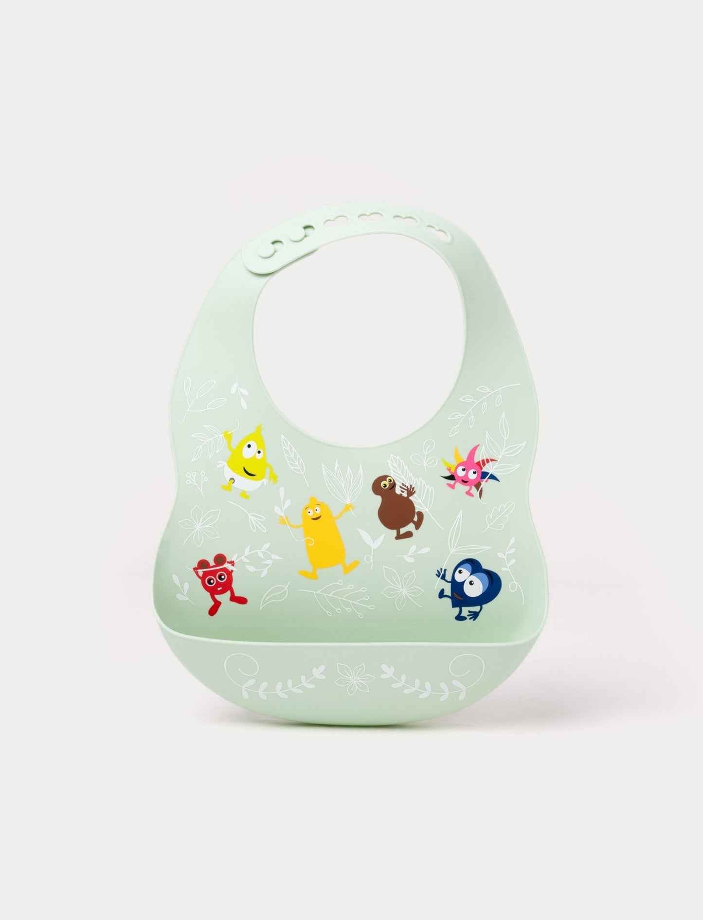 A soft green silicone baby bib with Babblarna characters and a leaf pattern, featuring a built-in food catcher.