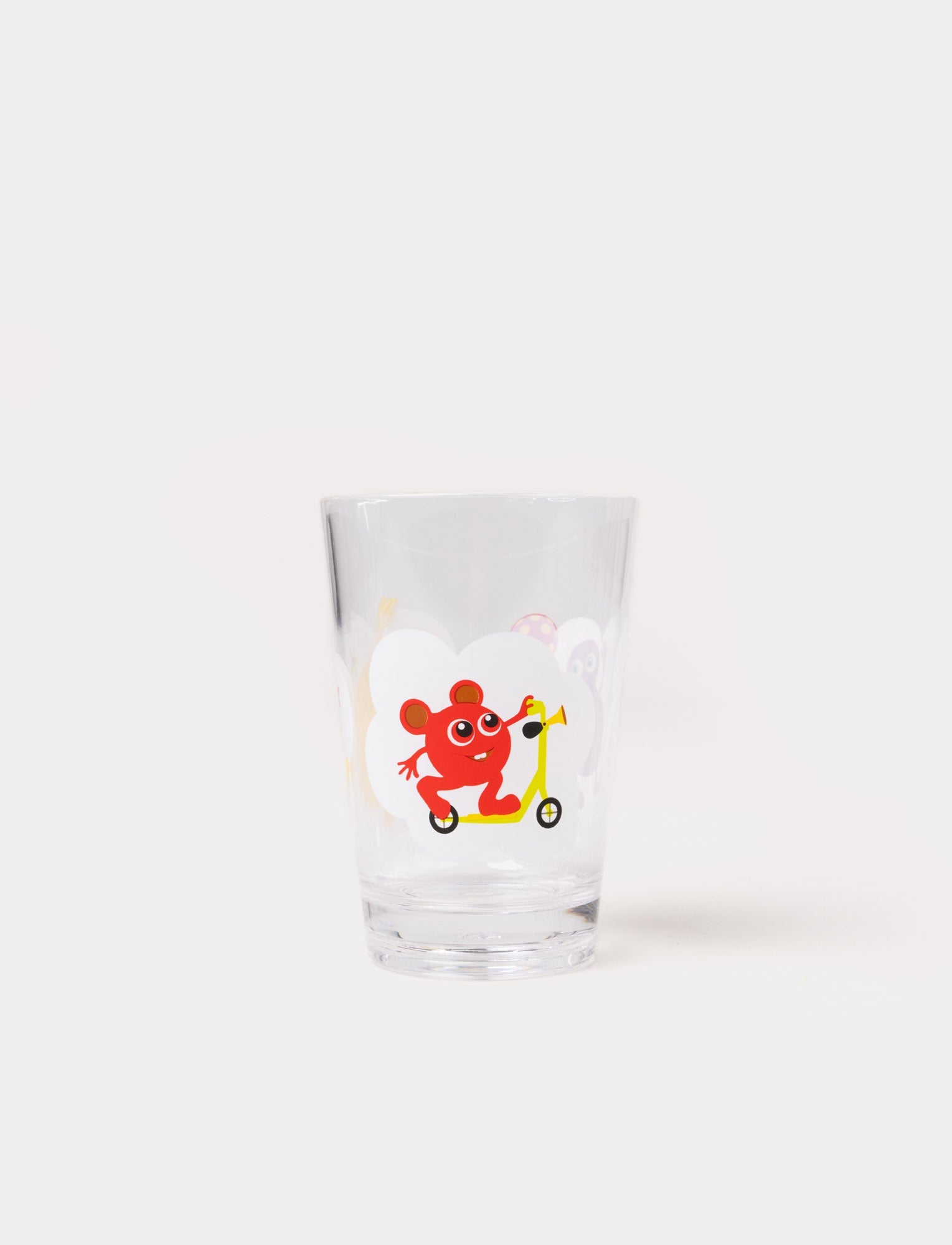  Image of Clear drinking glass with colorful Babblarna characters playing on a cloud background.