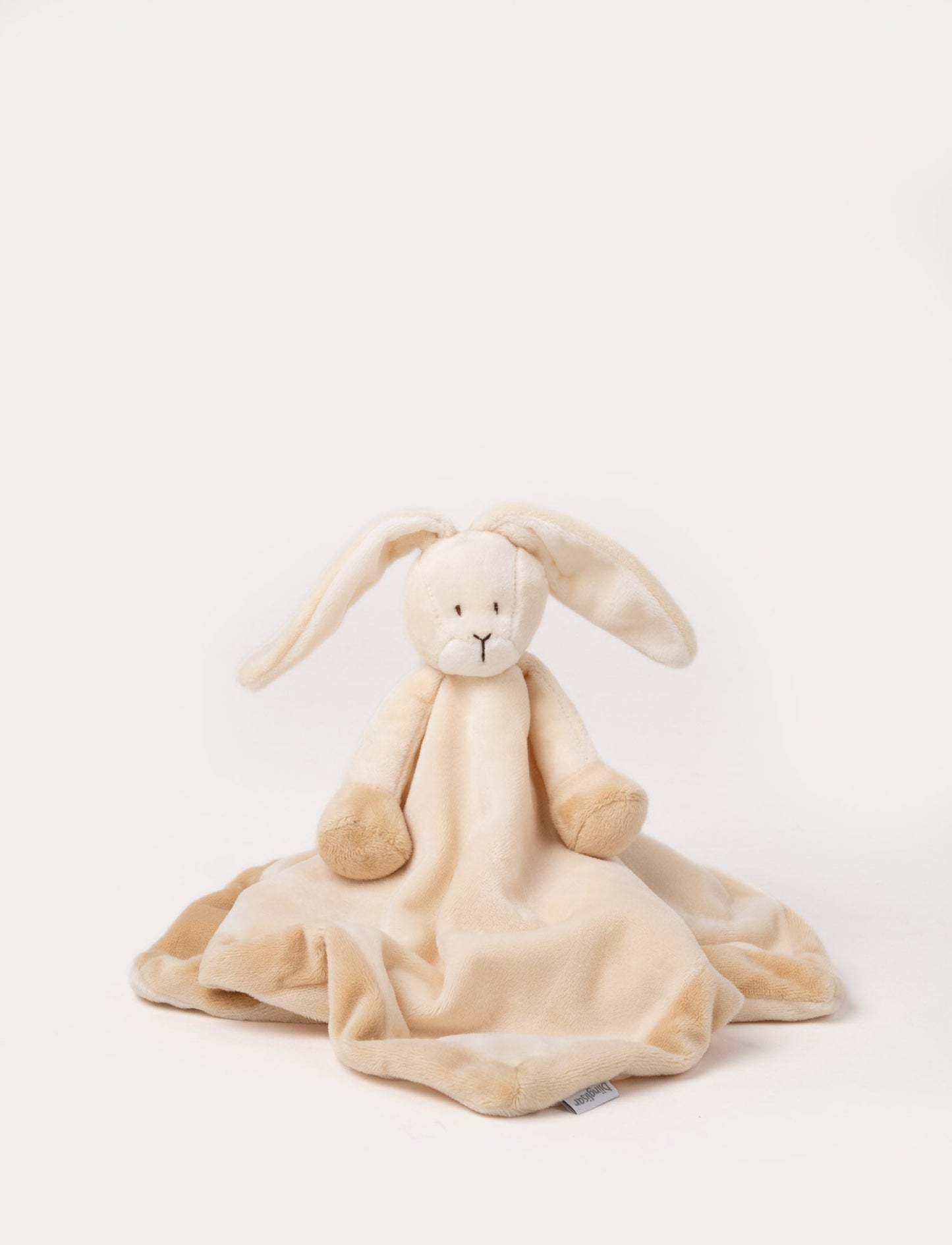 A beige-brown baby blanket with a soft plush bunny, white contrast details