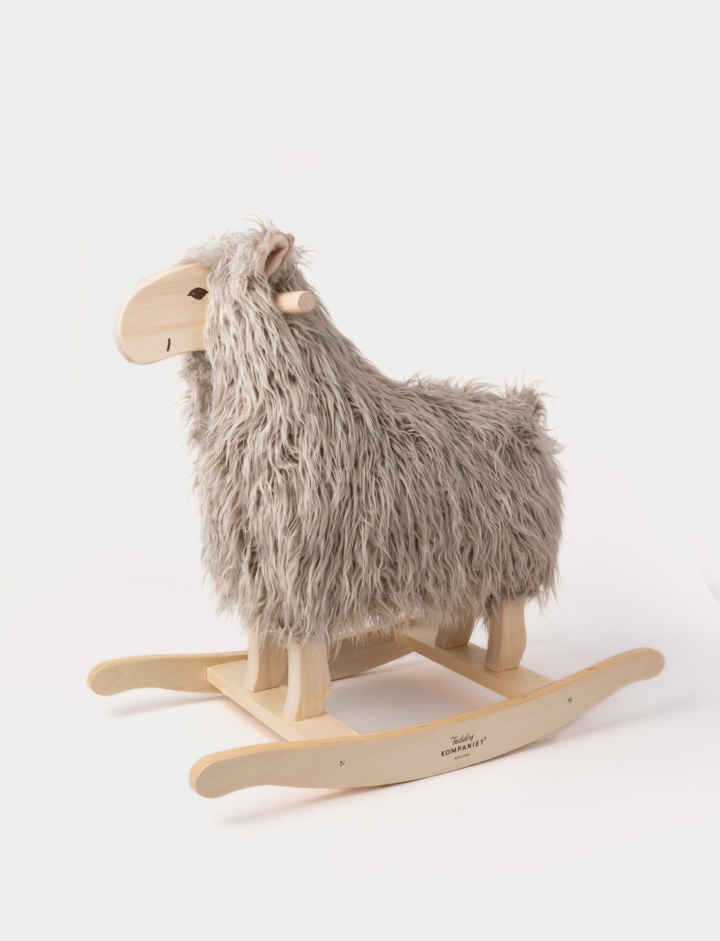 Rocking sheep with grey fur, a wooden face, and a sturdy wooden base.