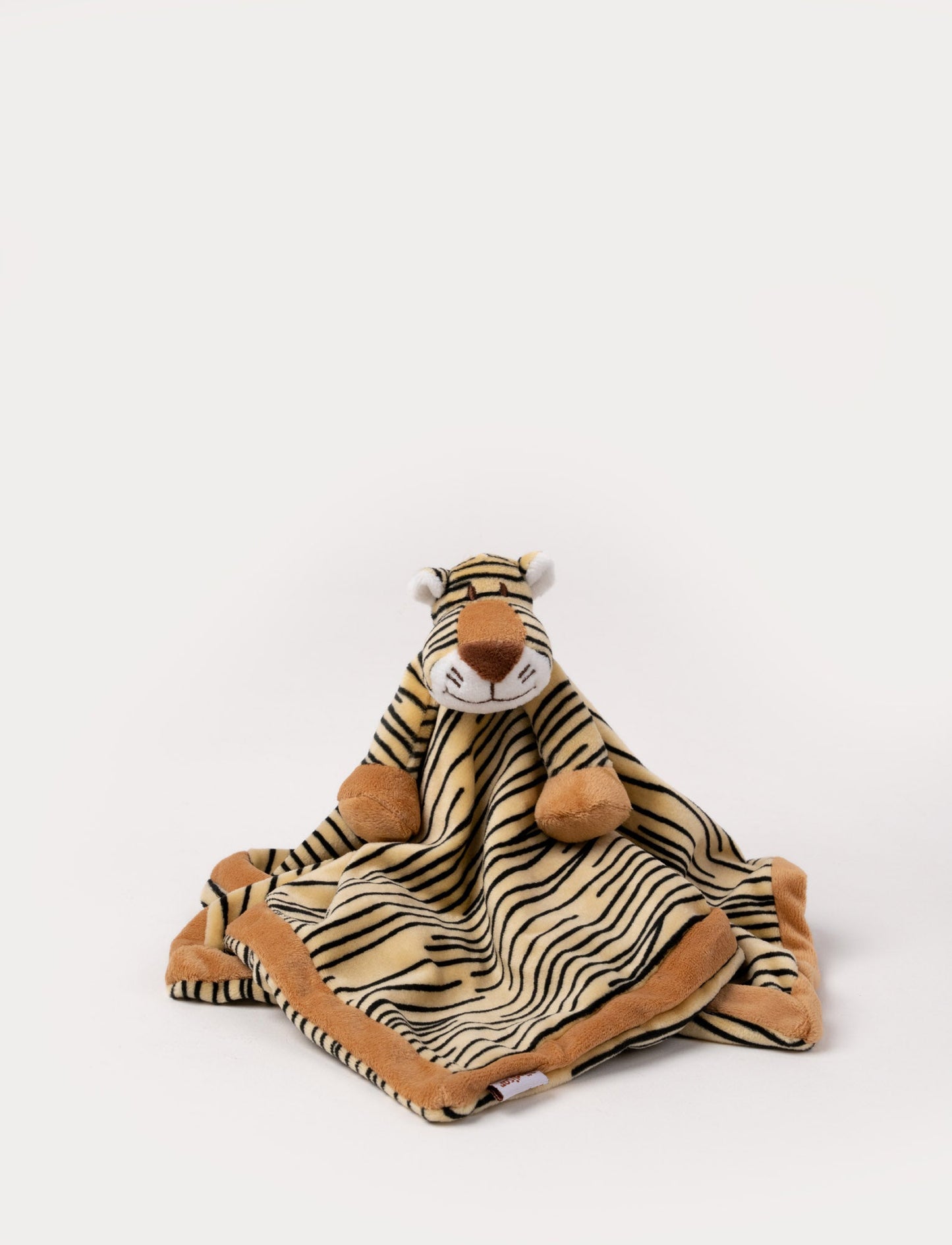 A soft tiger-shaped baby blanket with beige and brown details