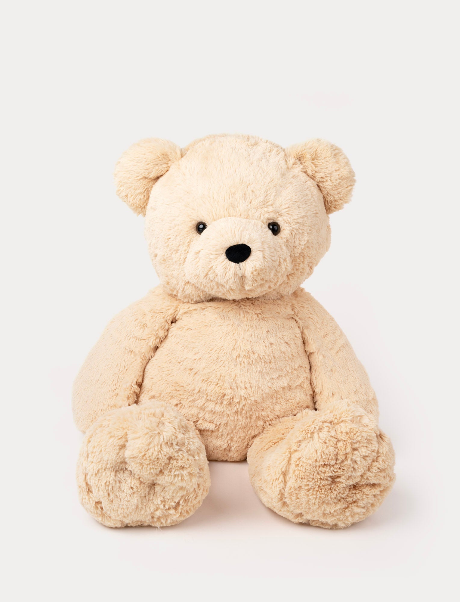  Image of Large 100 cm beige plush teddy bear with a soft, fluffy texture and a friendly expression.