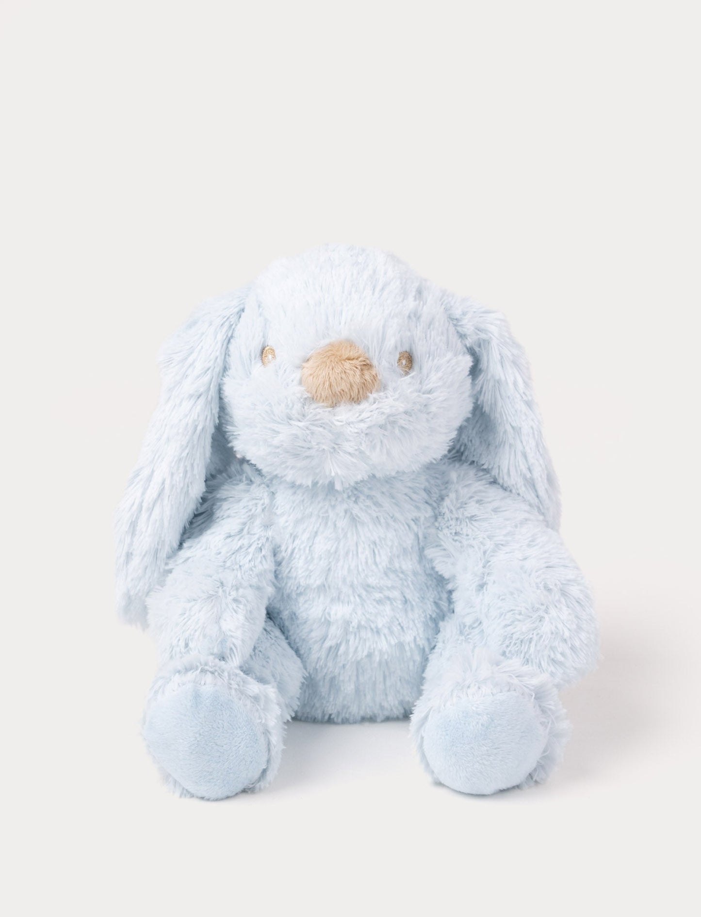 A soft blue plush bunny with floppy ears, a beige nose, and golden-stitched eyes