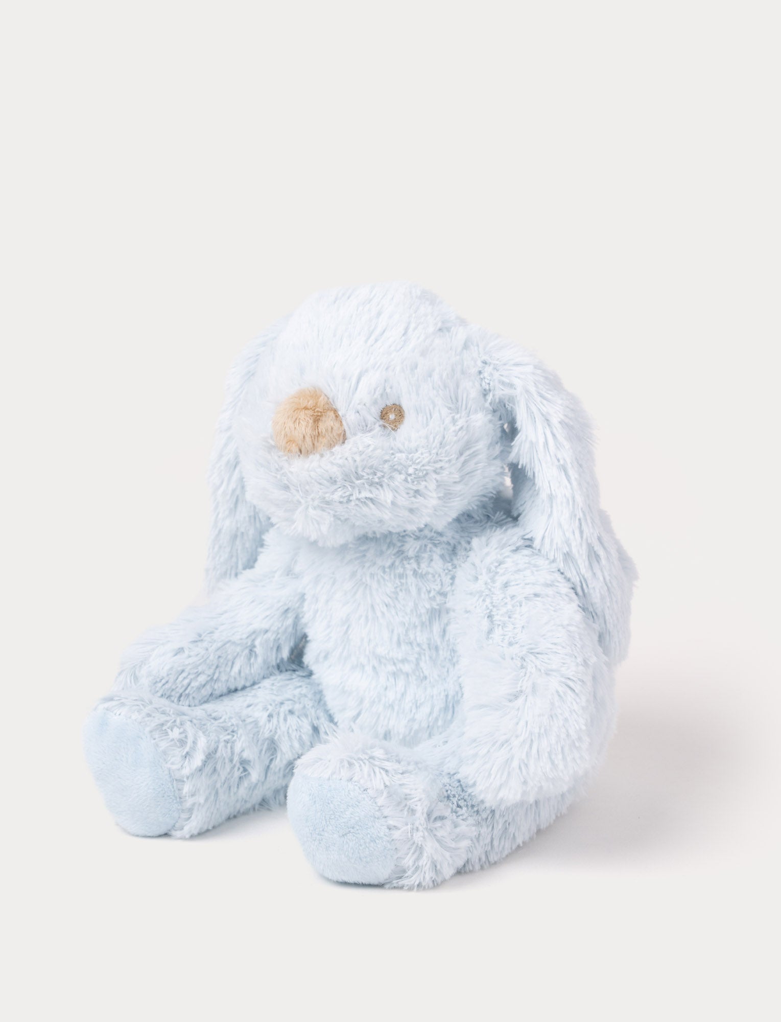  Image of A soft blue plush bunny with floppy ears, a beige nose, and golden-stitched eyes.