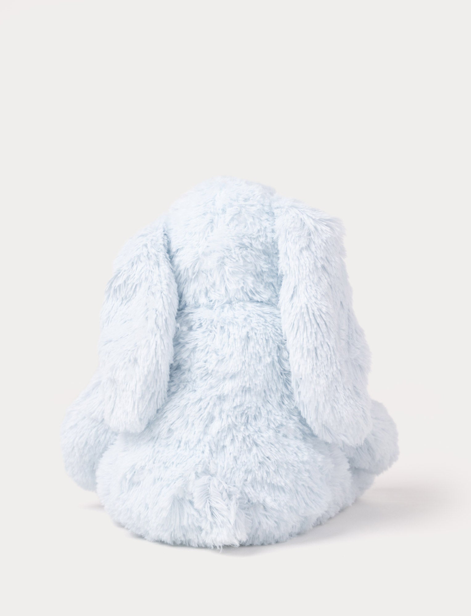  Image of A soft blue plush bunny with floppy ears, a beige nose, and golden-stitched eyes.