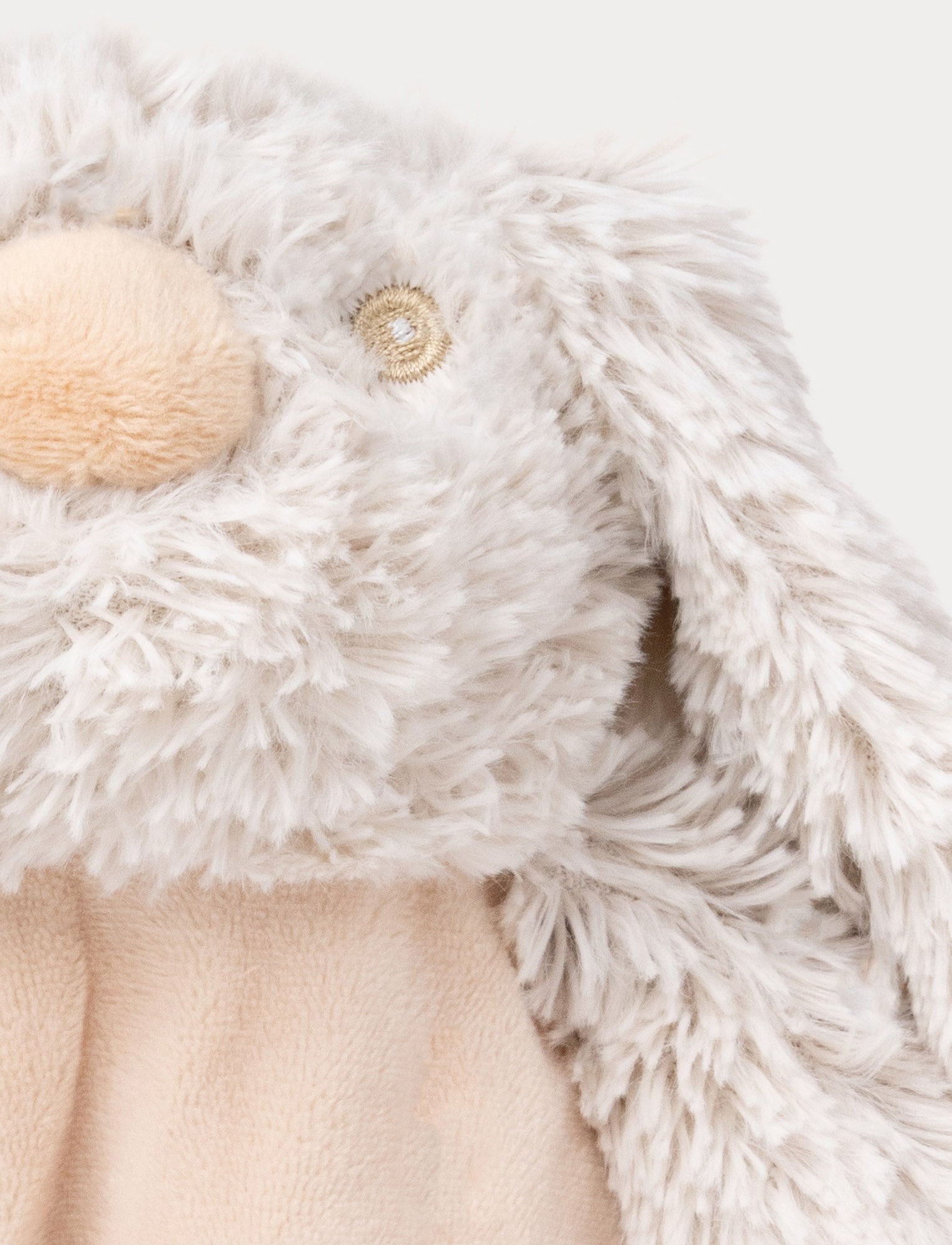  Image of Soft baby blanket with a plush beige bunny head, floppy furry ears, and a cozy fabric body.