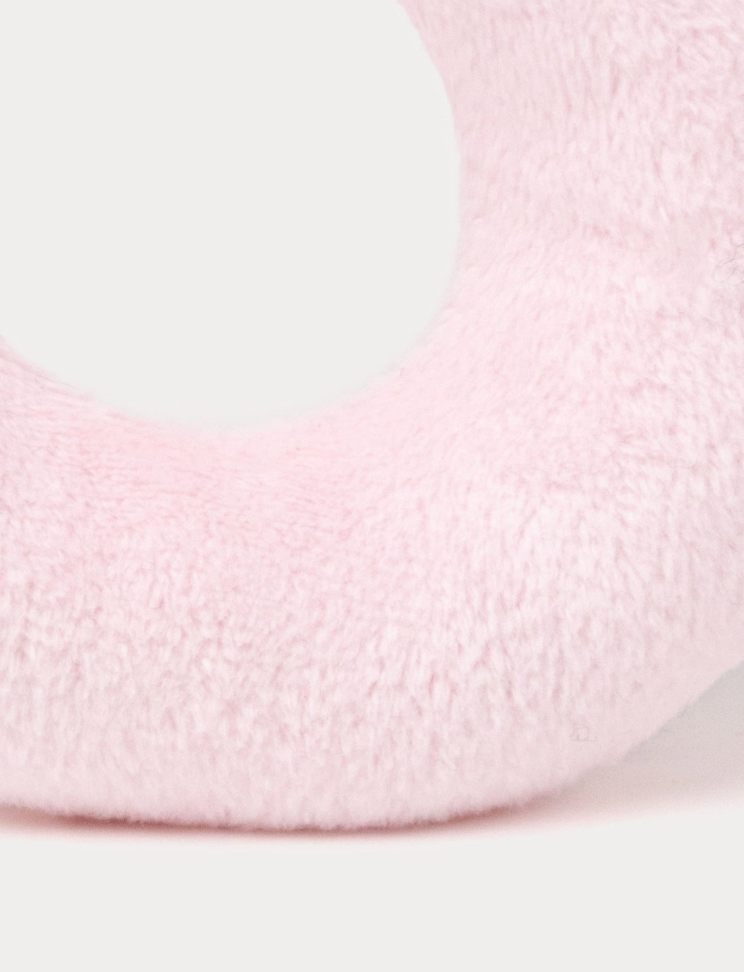 Soft pink baby rattle with a plush bunny head and floppy furry ears.