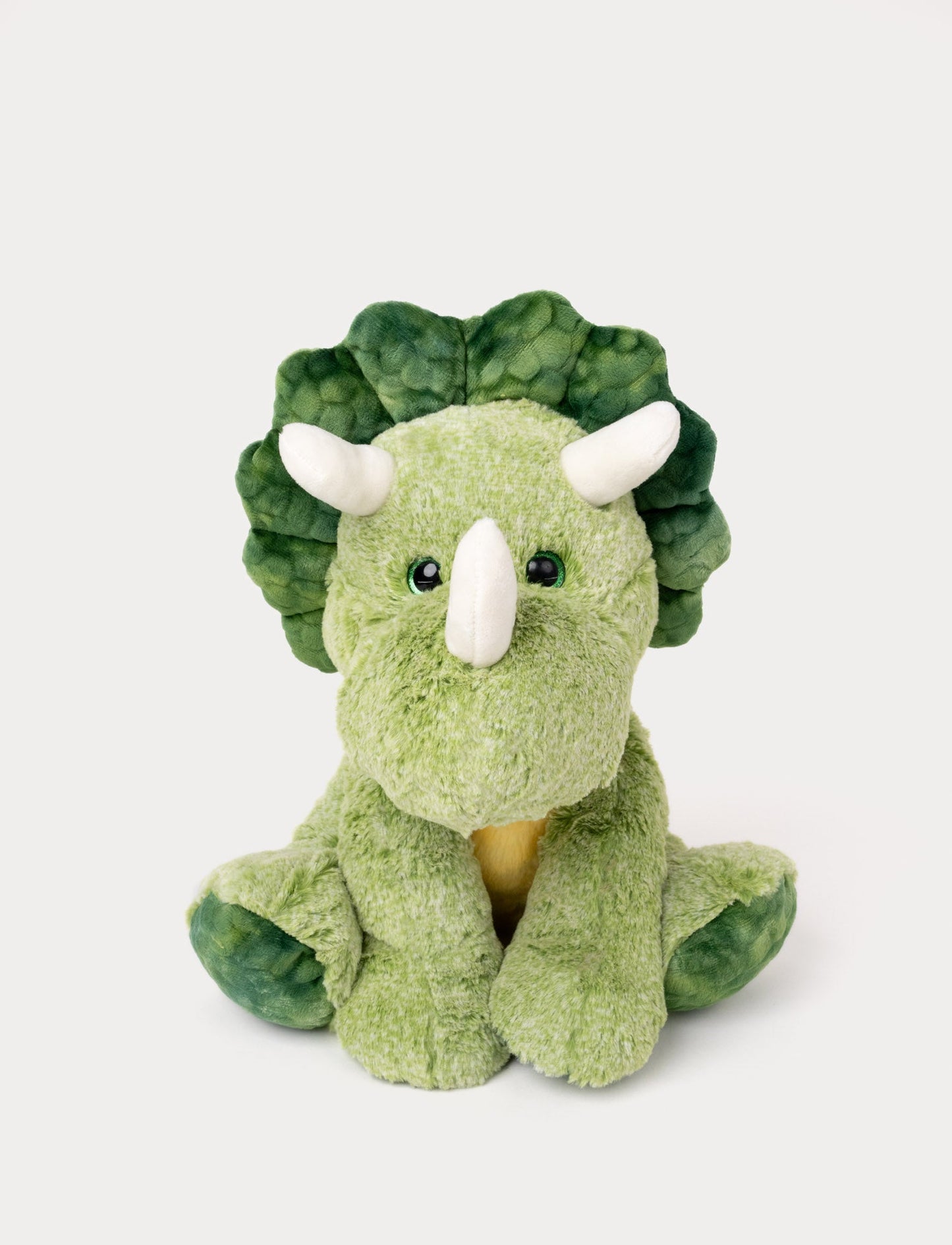 Soft green plush triceratops with three white horns and green shiny eyes.