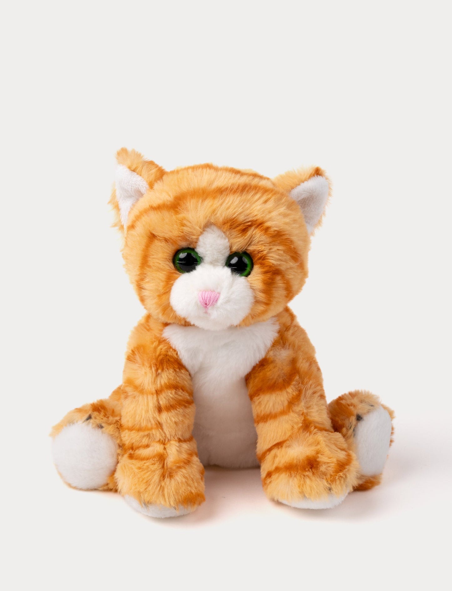 Soft orange striped kitten plush with green eyes, a pink nose, and white paws.