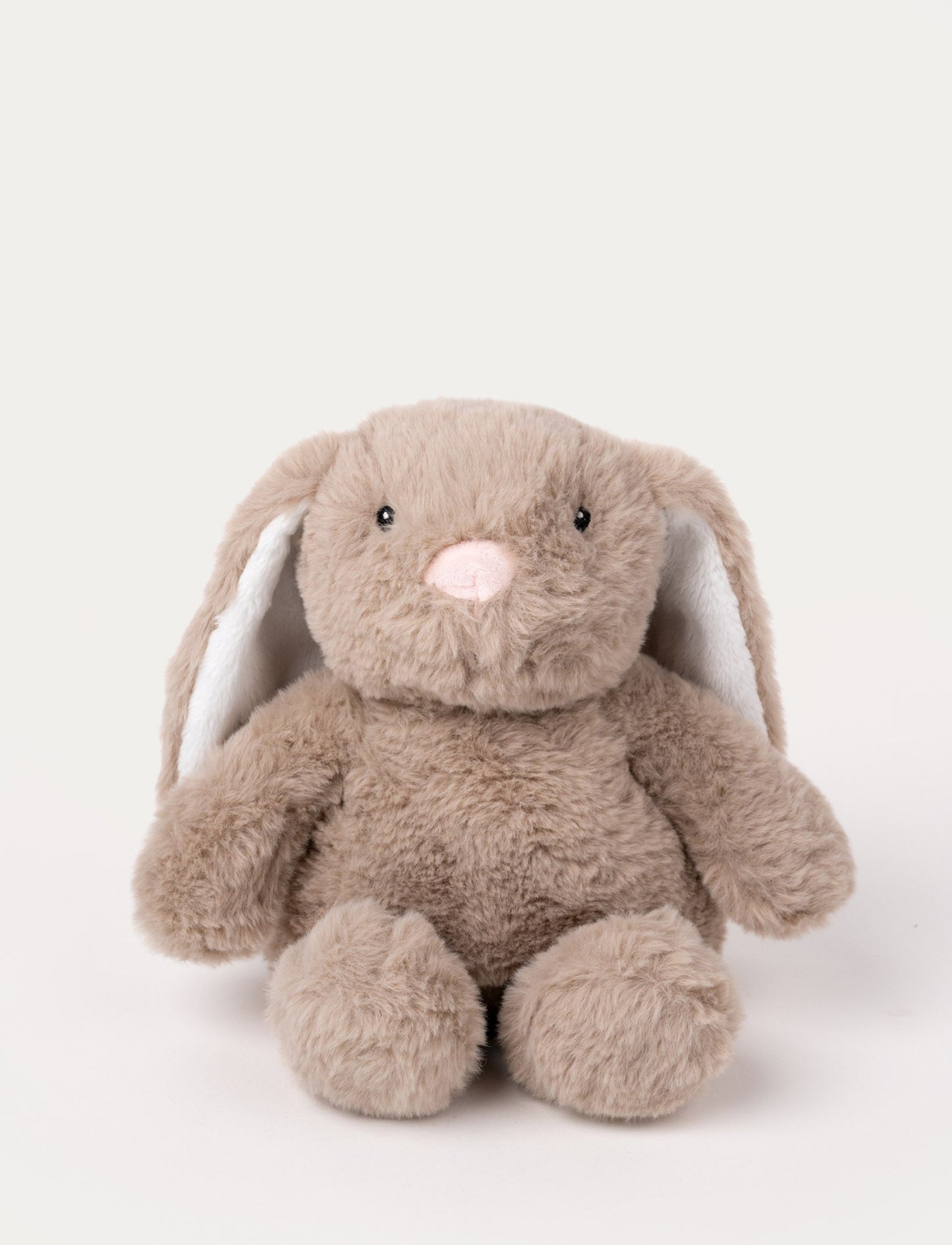 Soft, light brown plush bunny with long floppy ears, black eyes, and a pink stitched nose.