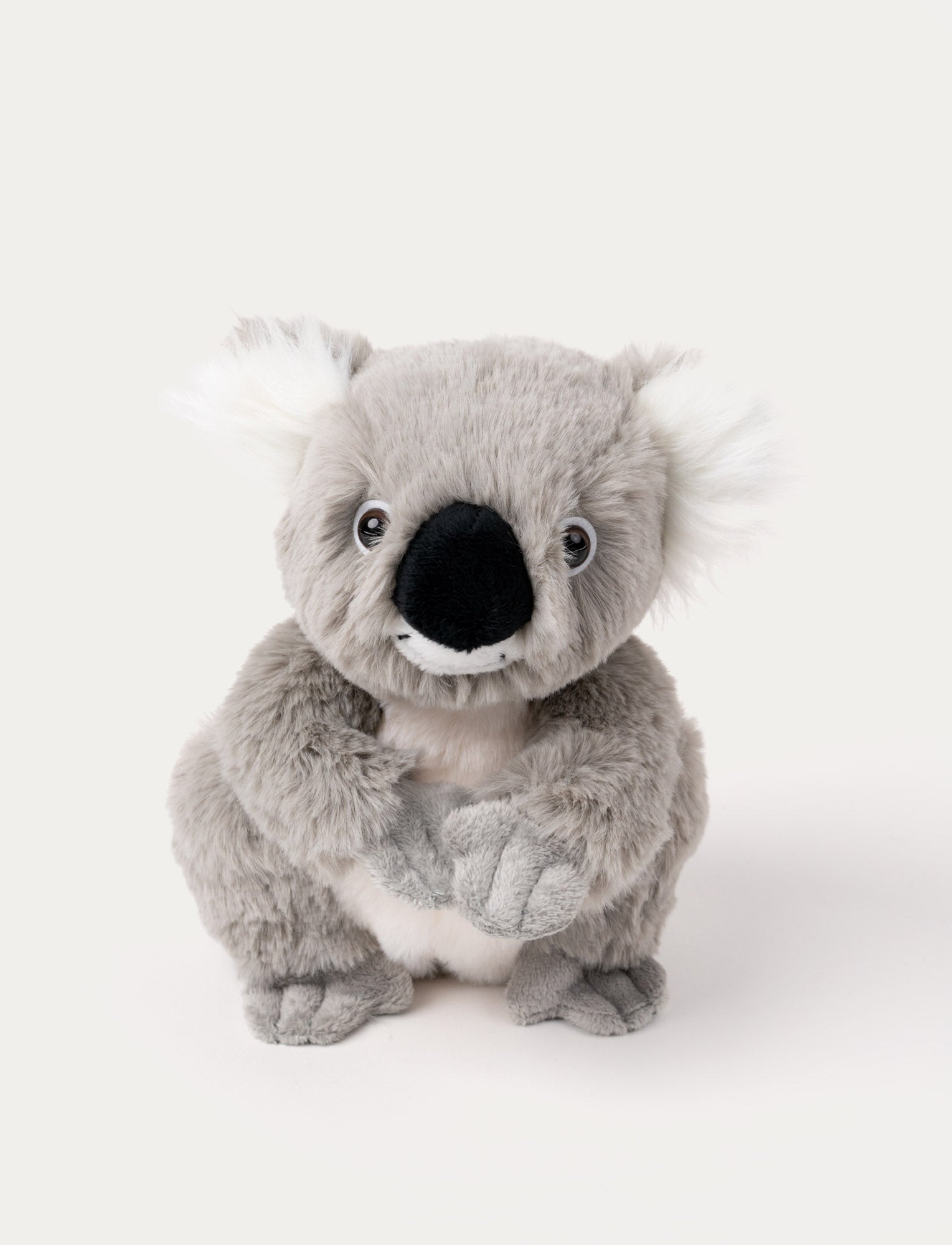  Image of Soft grey koala plush with fluffy white ears, a black nose, and shiny plastic eyes.