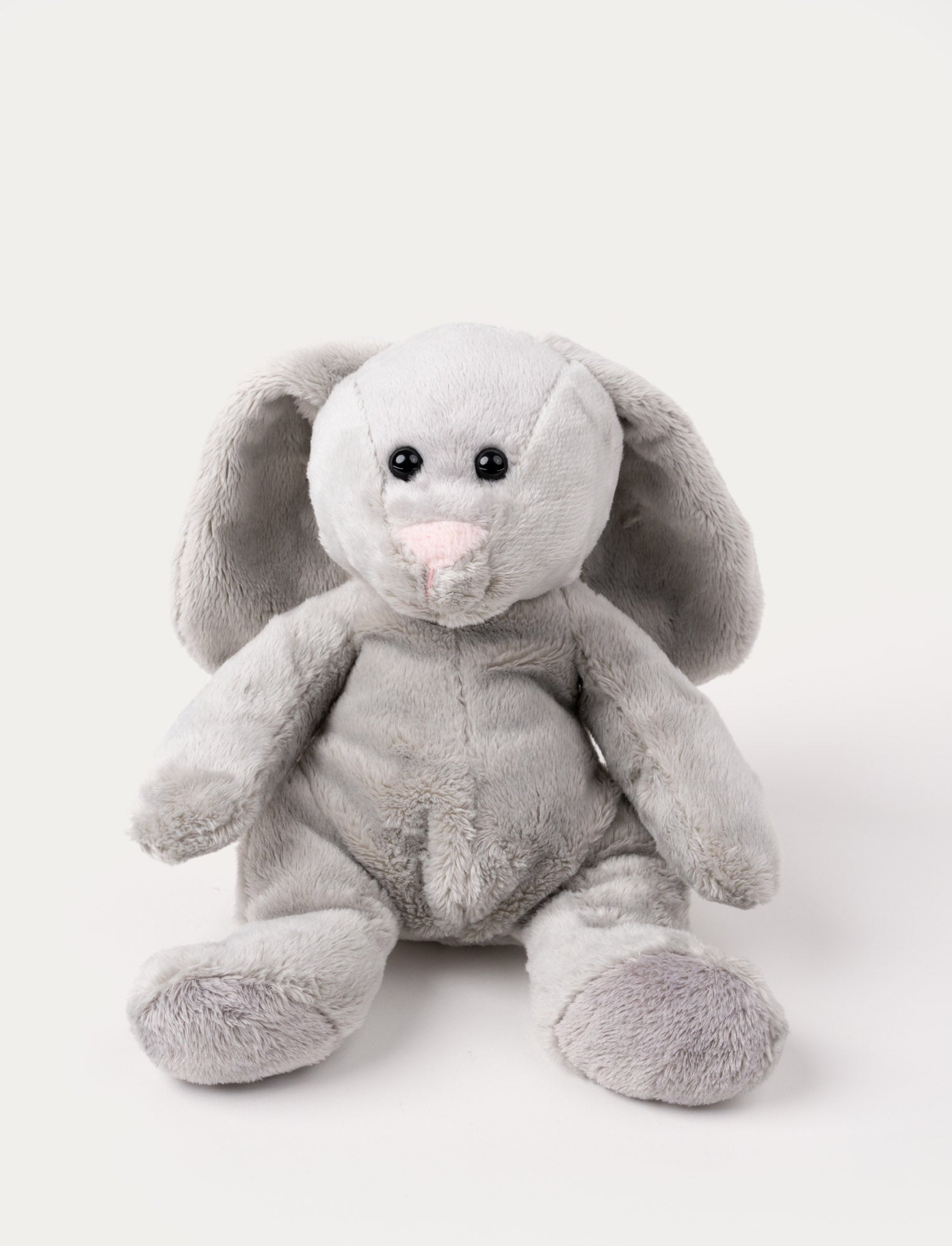  Image of Soft grey bunny plush with long floppy ears, a pink nose, and shiny black eyes.