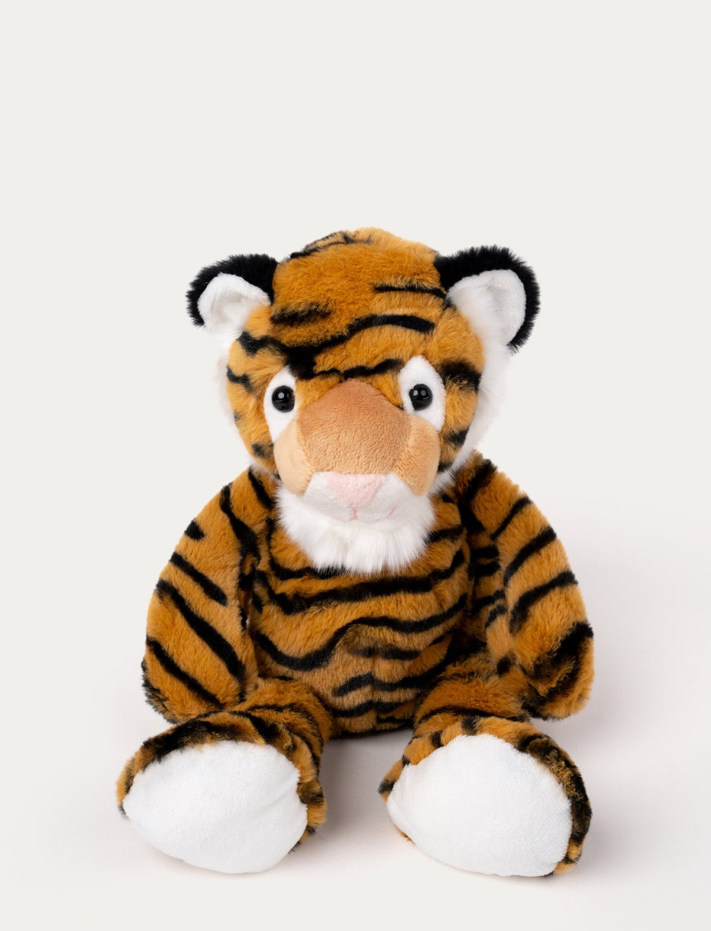 Soft plush tiger with orange and black stripes, white accents, black-tipped ears, and a stitched pink nose.