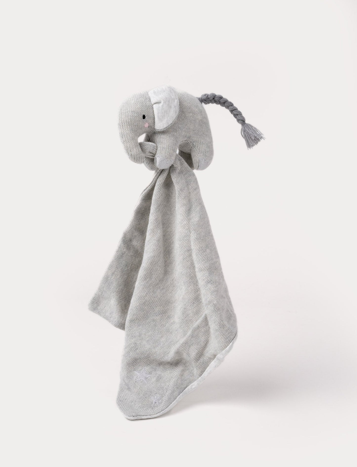 Knitted grey elephant security blanket with soft fabric ears, embroidered eyes, and a braided tail.