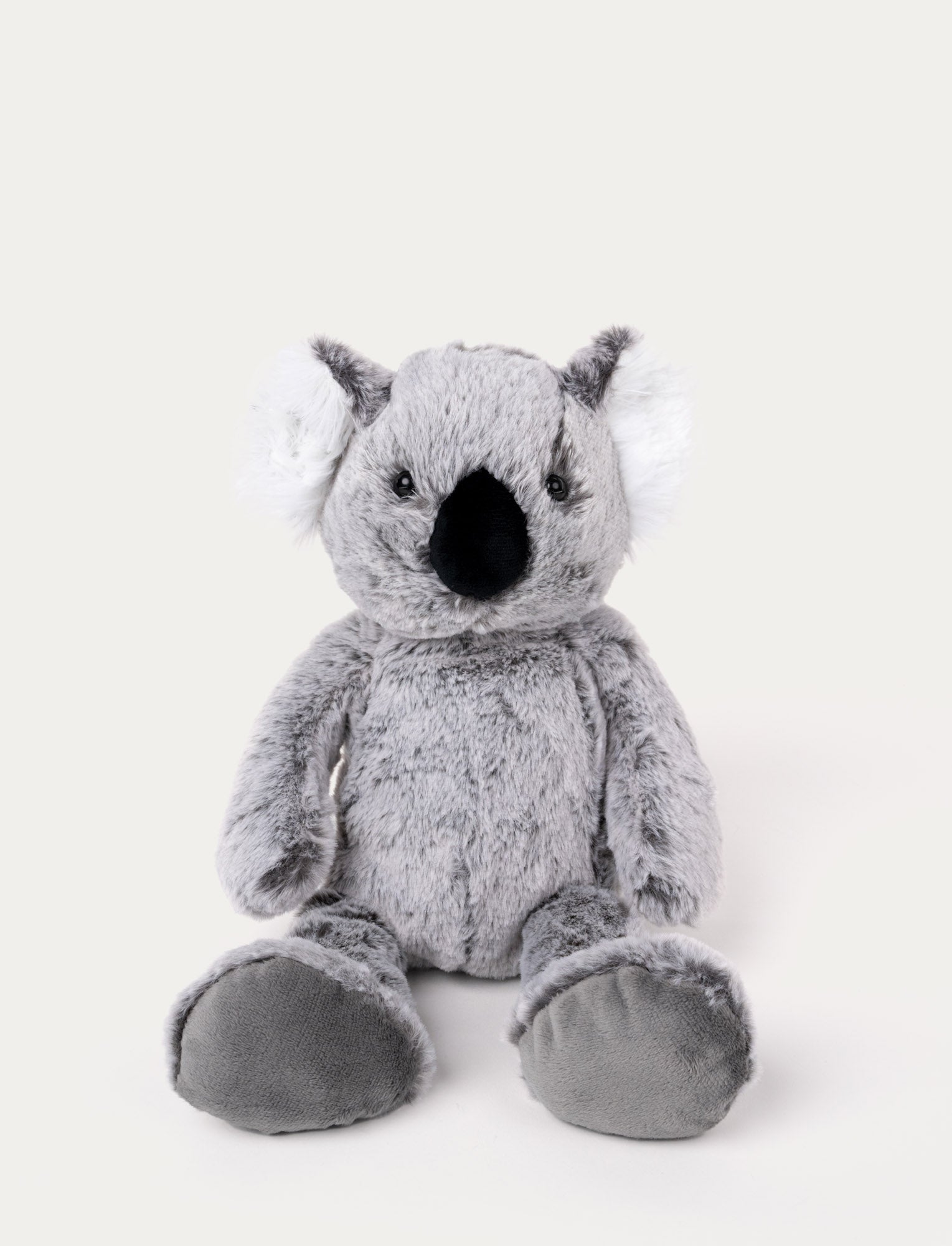  Image of Soft, plush koala with grey fur, fluffy white ears, a black nose, and large padded feet, sitting upright.