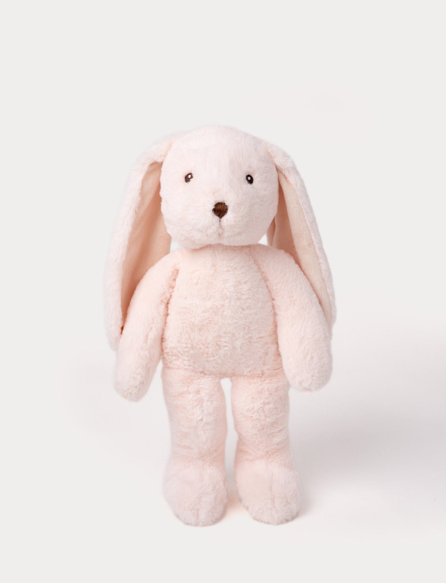 Soft, plush bunny with light pink fur, long floppy ears, black button eyes, and a small stitched nose.