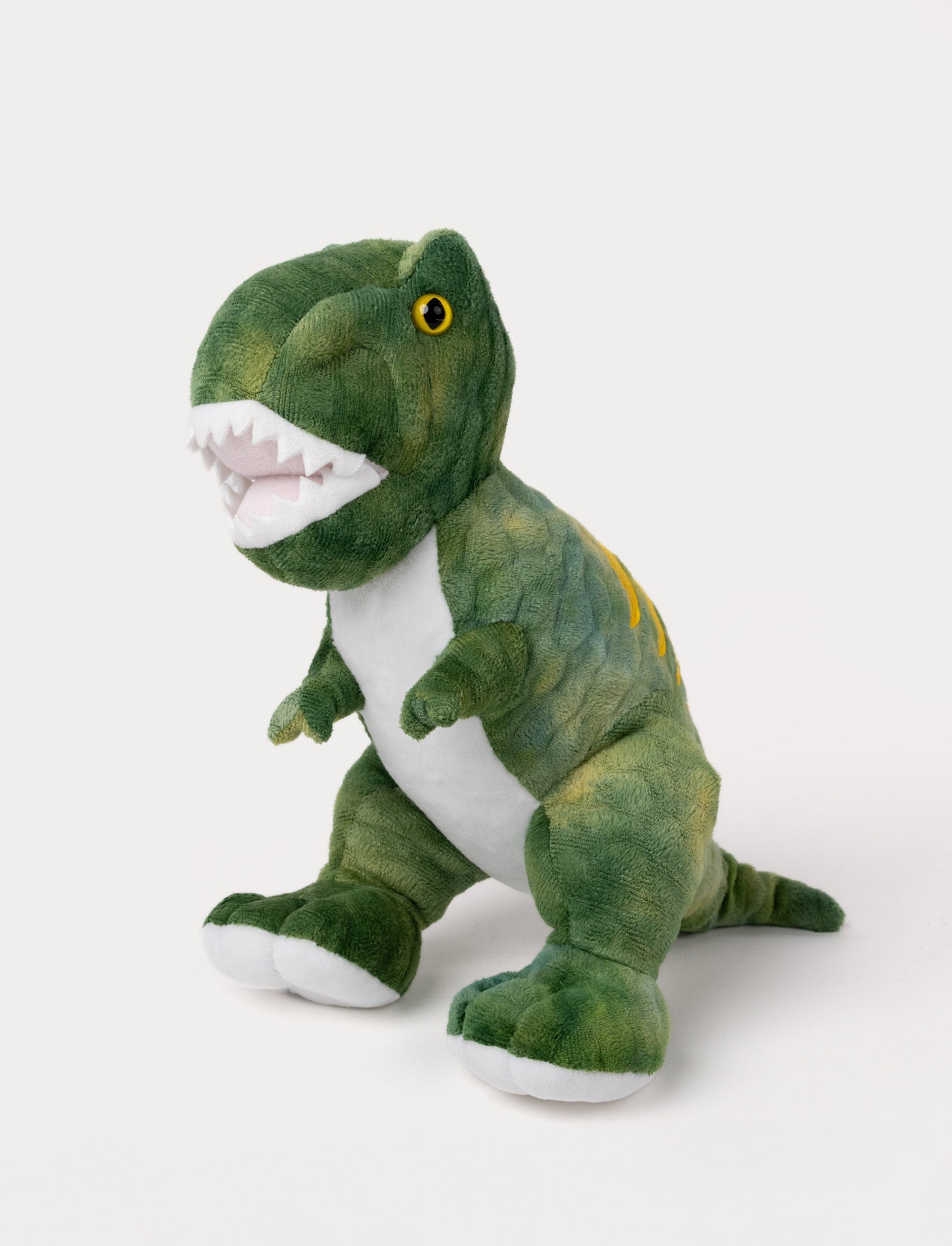  Image of Soft, plush T-Rex with green textured fur, a white belly, yellow eyes, embroidered details, and an open mouth with plush teeth.