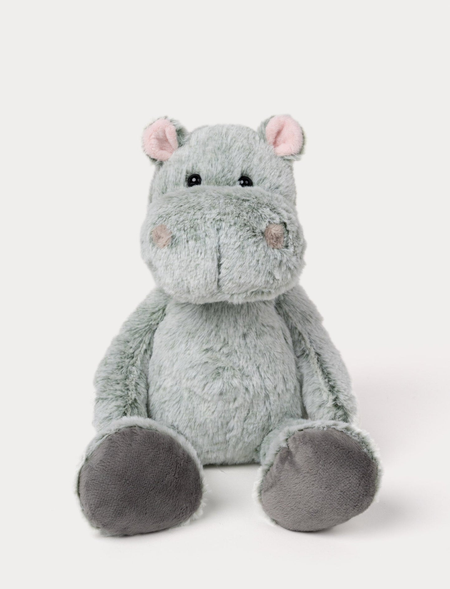 oft, plush hippo with light grey/green fur, round black eyes, small pink ears, and dark grey paw pads.