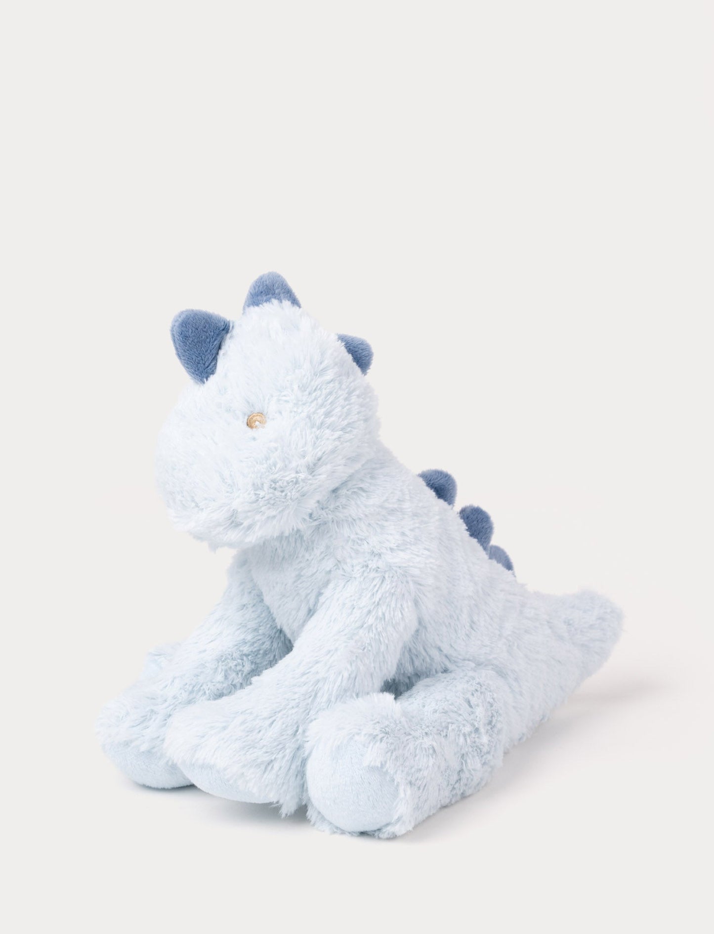 Soft plush light blue dino with dark blue fabric spikes and a fluffy texture.