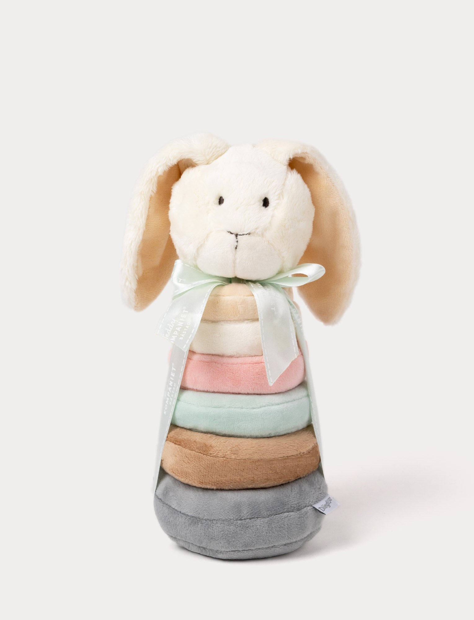  Image of A plush bunny ring stacker toy with pastel-colored rings, floppy ears, and a decorative ribbon