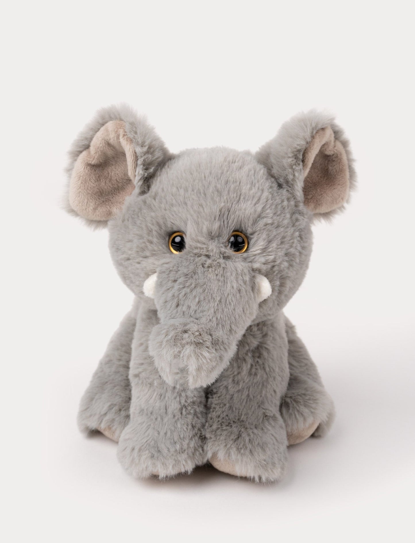 An elephant with cuddly grey fur, kind eyes, and a comforting expression.