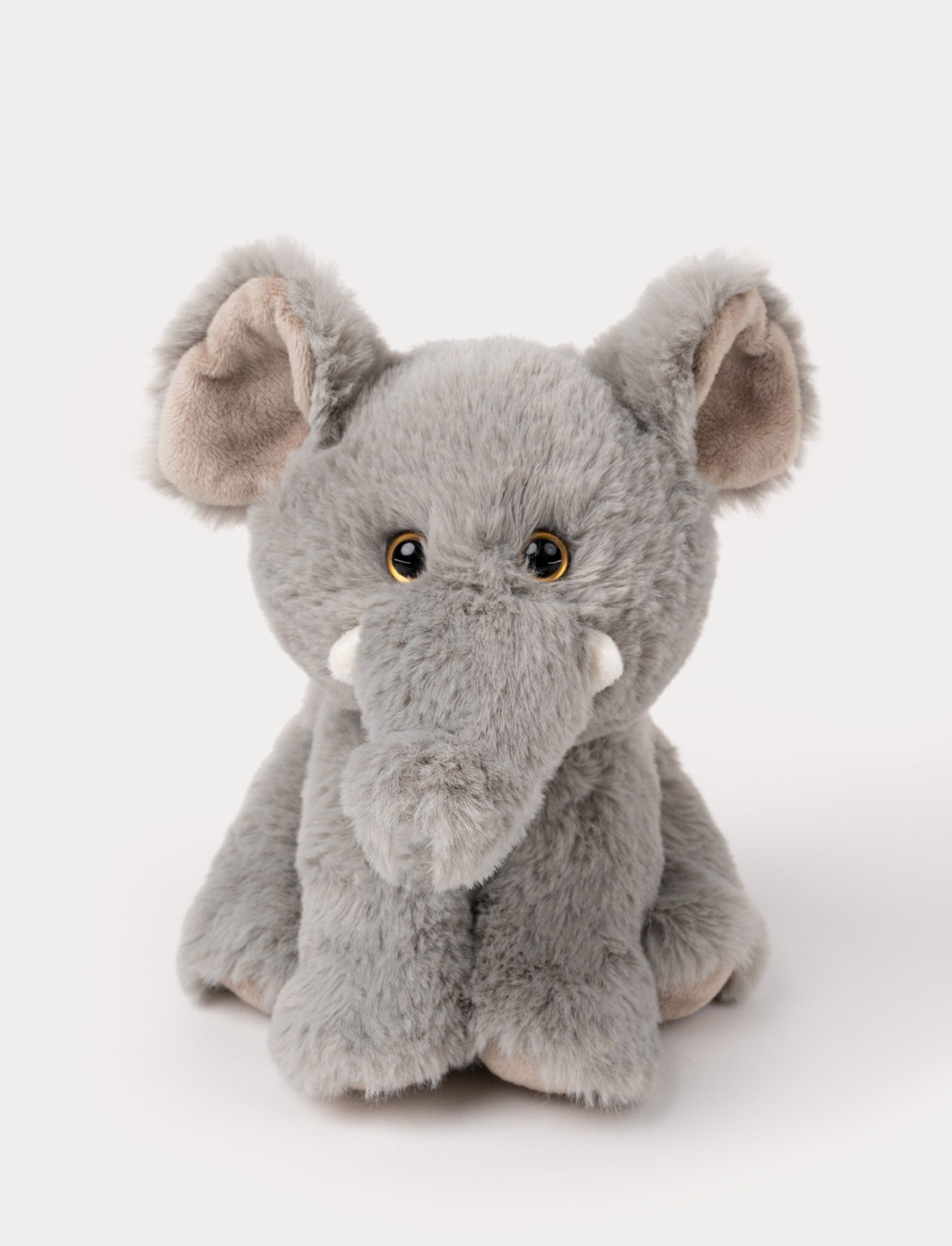  Image of An elephant with cuddly grey fur, kind eyes, and a comforting expression.