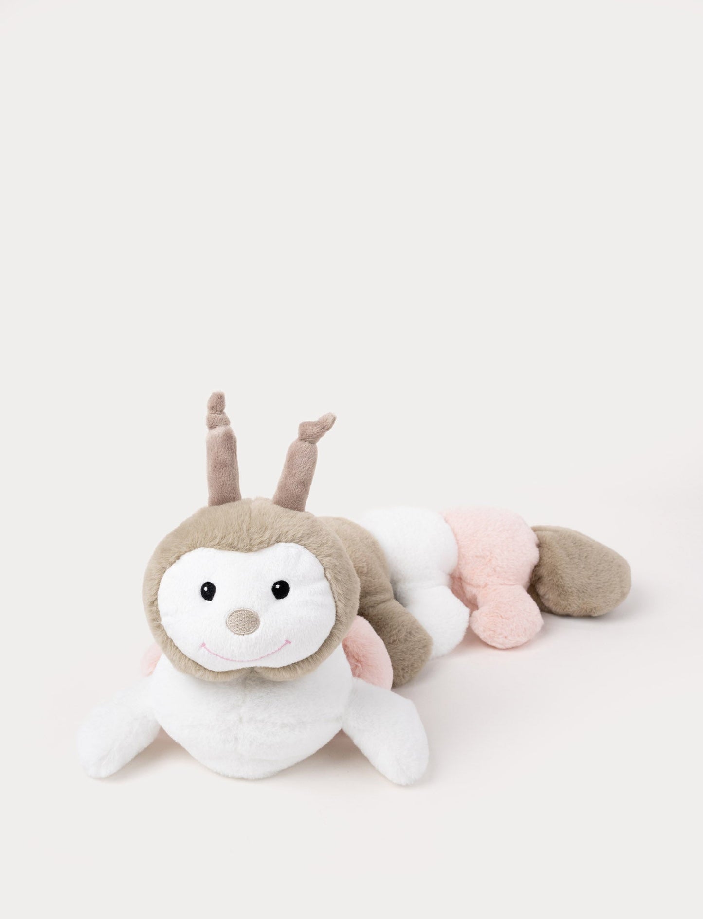 Plush caterpillar in pastel shades of light gray, soft pink, and white, with a round, segmented body and a gentle expression.