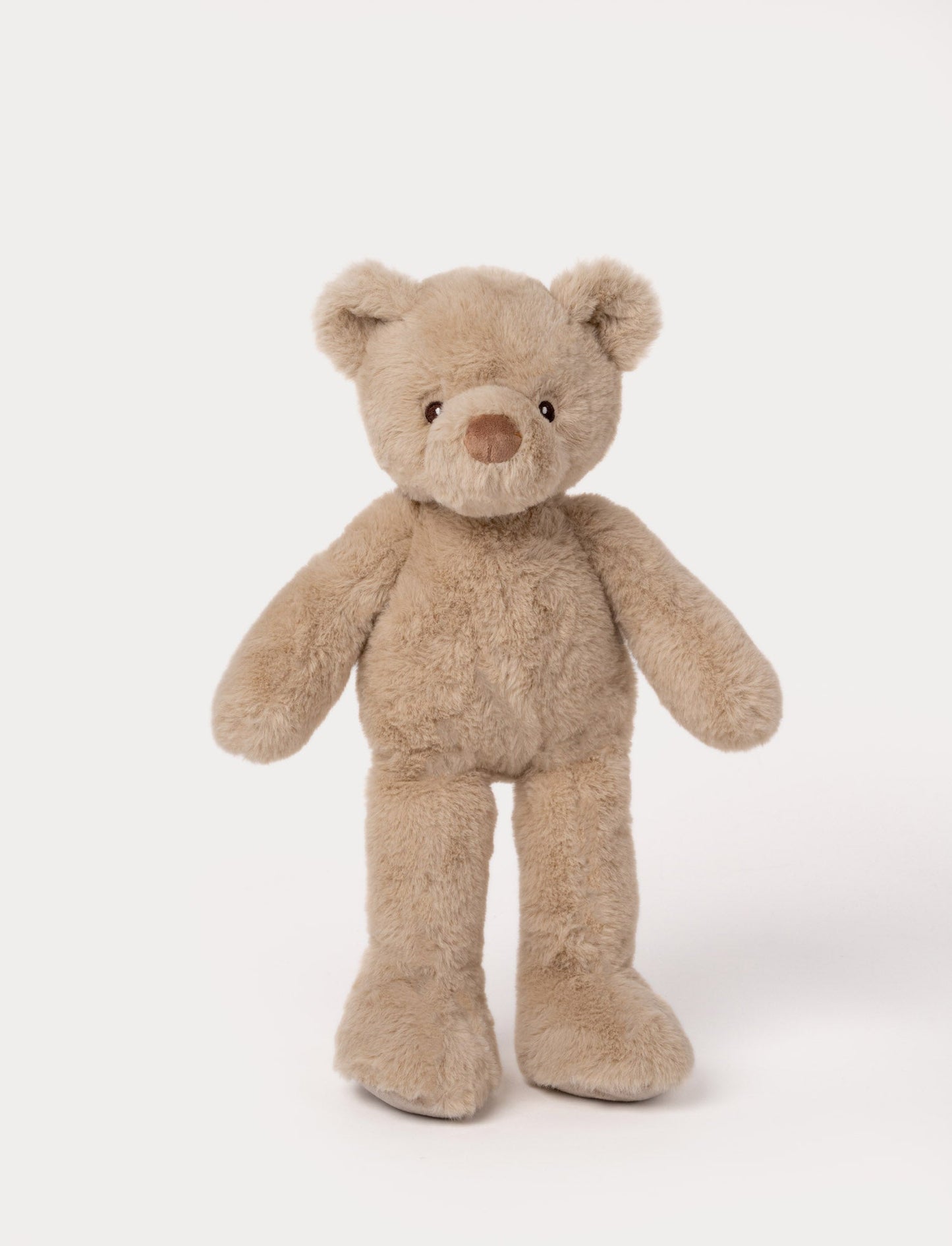 Beige plush teddy bear with long legs, round ears, and a soft brown nose.