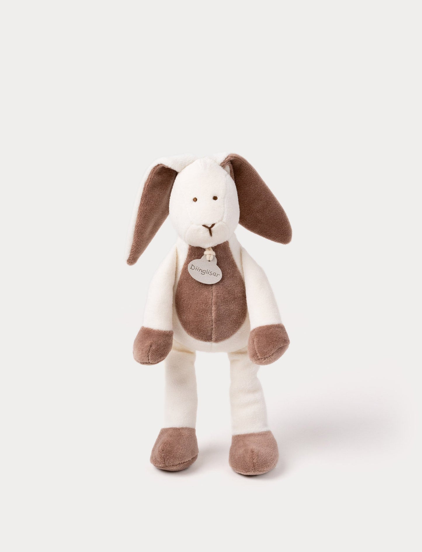 A soft plush beige bunny  with broaded eyes and nose, white, and brown details.