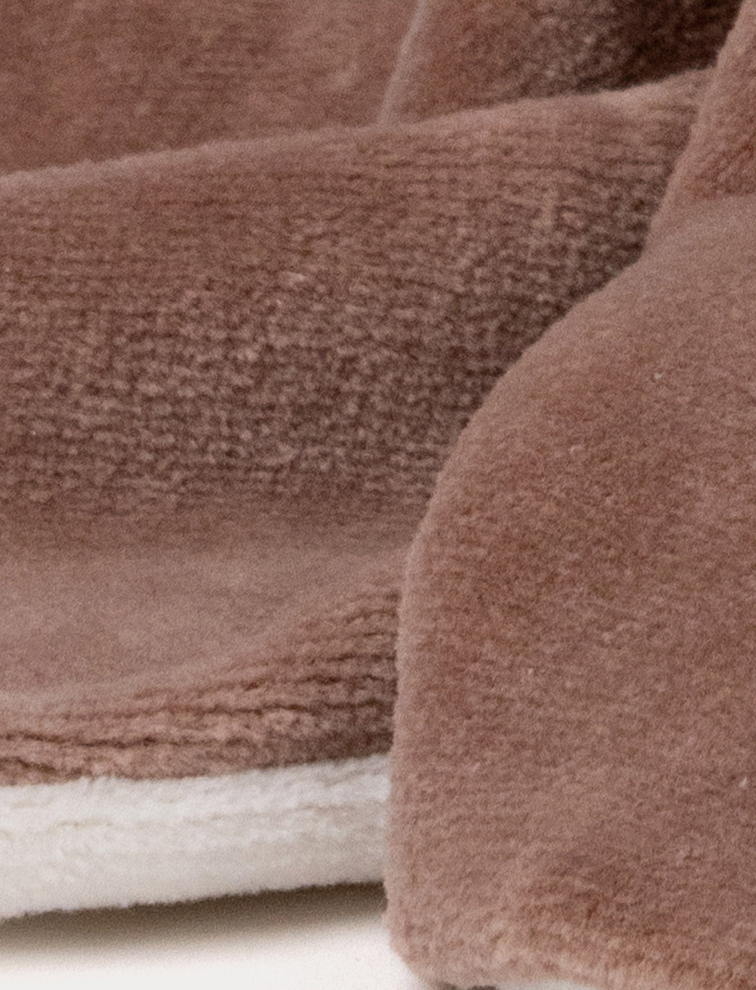  Image of A soft brown moose baby blanket with white antlers, a stitched face and white and brown details.