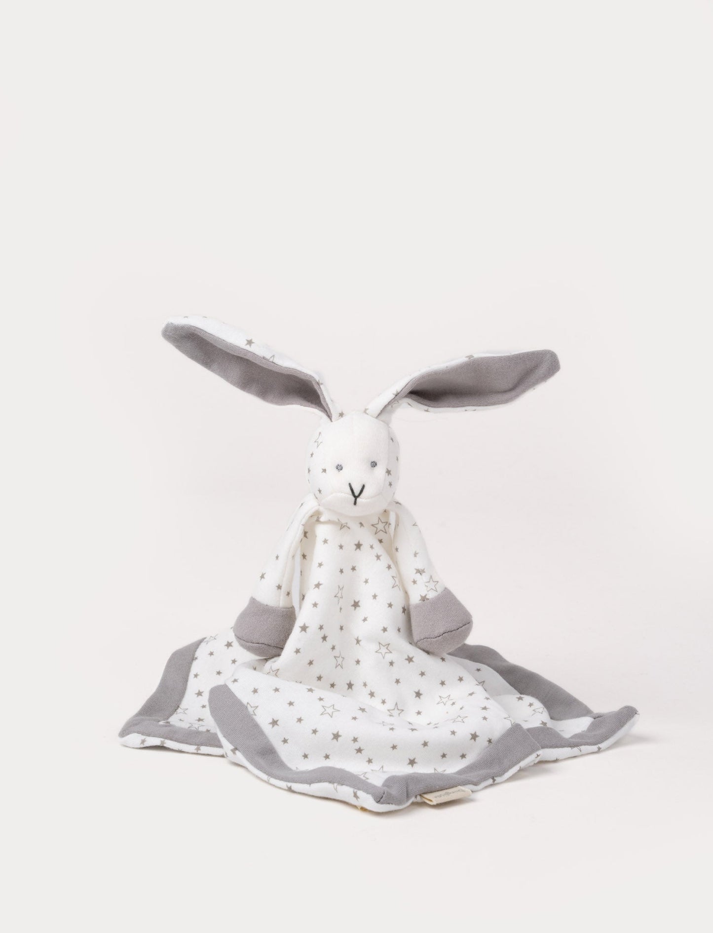 Soft baby blanket with a plush bunny head, long gray ears, and a white star-patterned fabric.