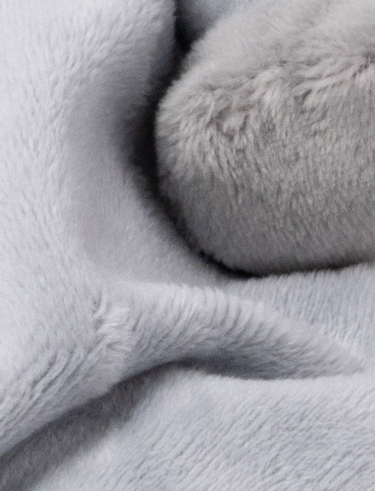  Image of Soft baby blanket with a plush gray llama head, white face, and white-trimmed edges.