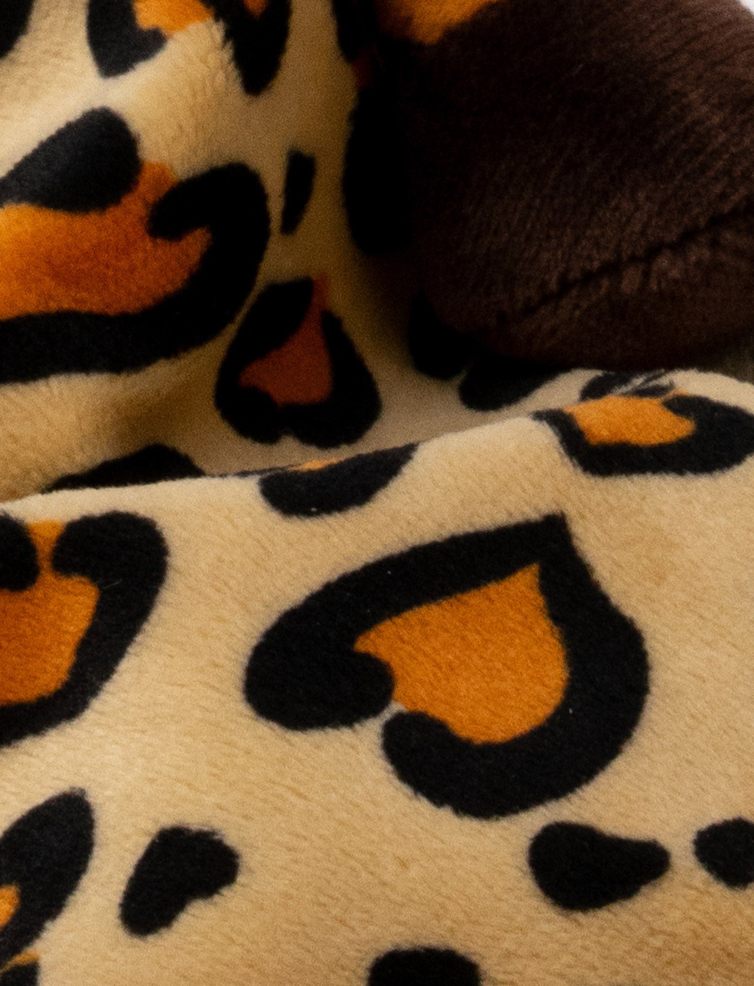  Image of Soft baby blanket with a plush leopard head, spotted pattern, and dark brown trim.