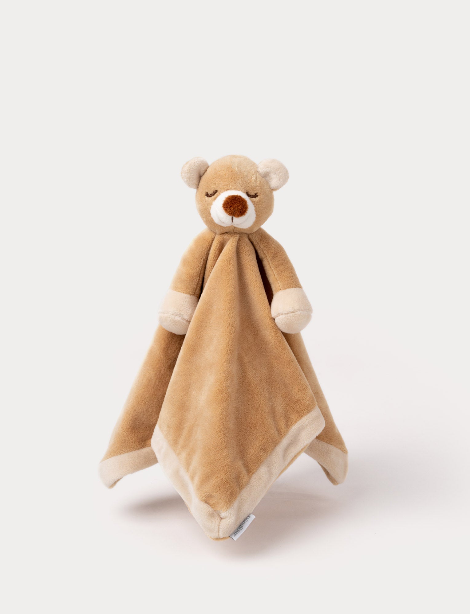  Image of Soft baby blanket with a plush brown bear head, closed eyes, and cream-trimmed edges.