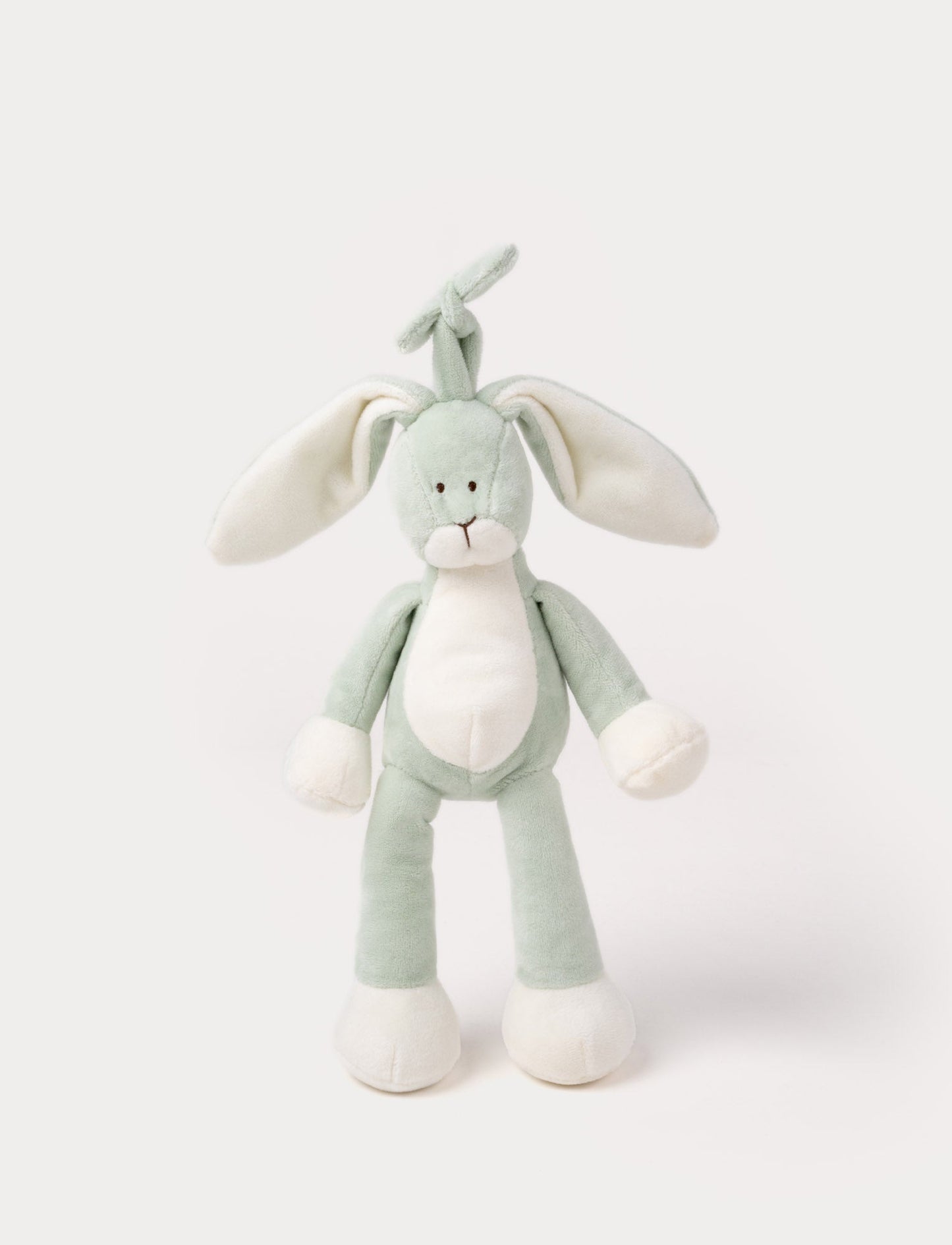 A plush sage green bunny music box with long floppy ears, a white belly, and a hanging loop.