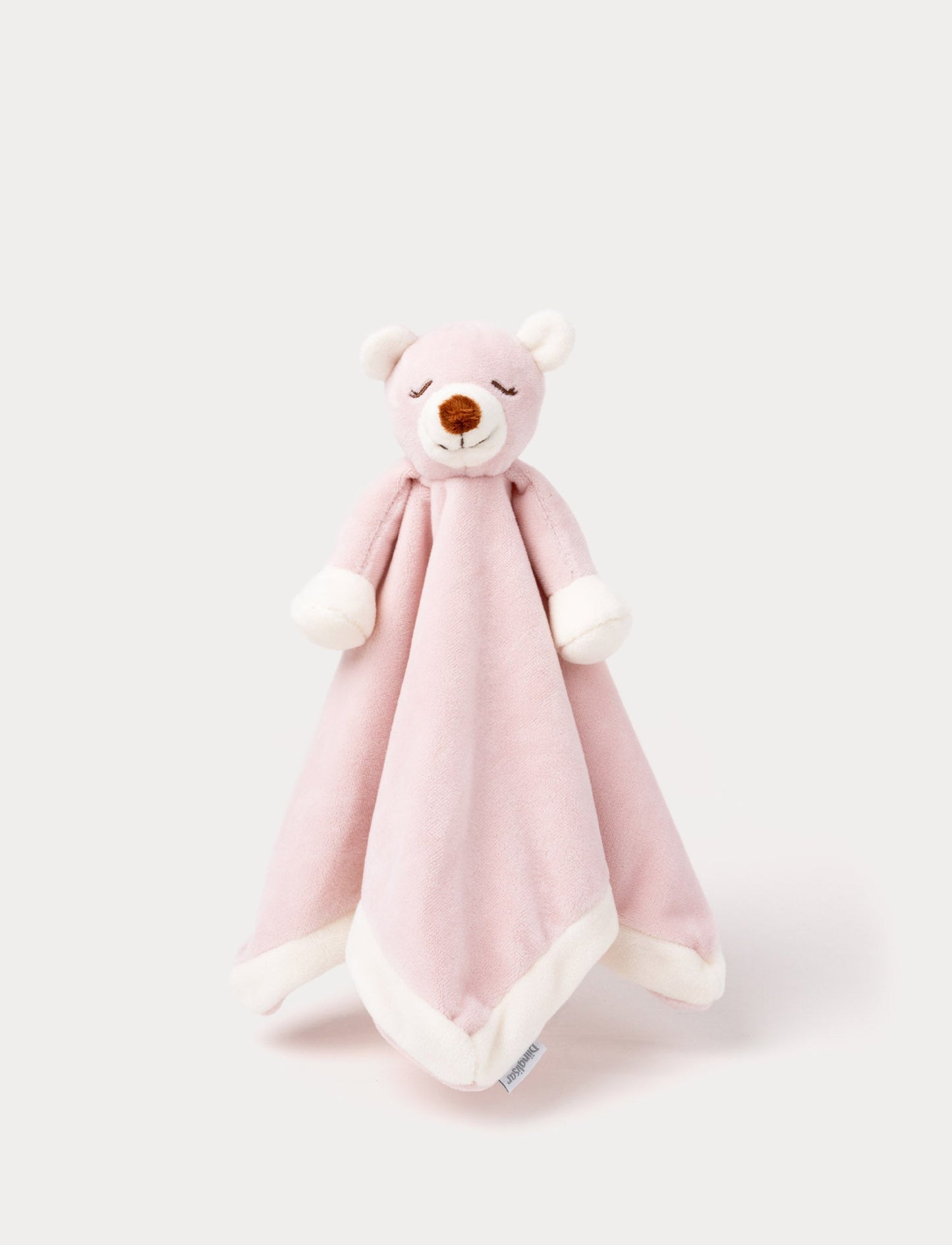 Soft baby blanket with a plush pink bear head, closed eyes, and white-trimmed edges.
