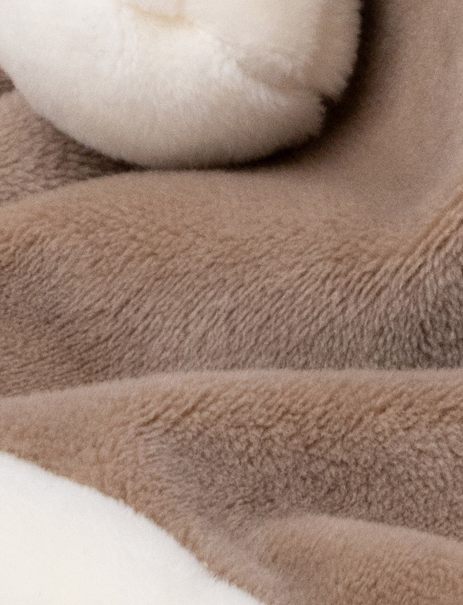  Image of Soft baby blanket with a plush brown hippo head, small pink ears, and white-trimmed edges.