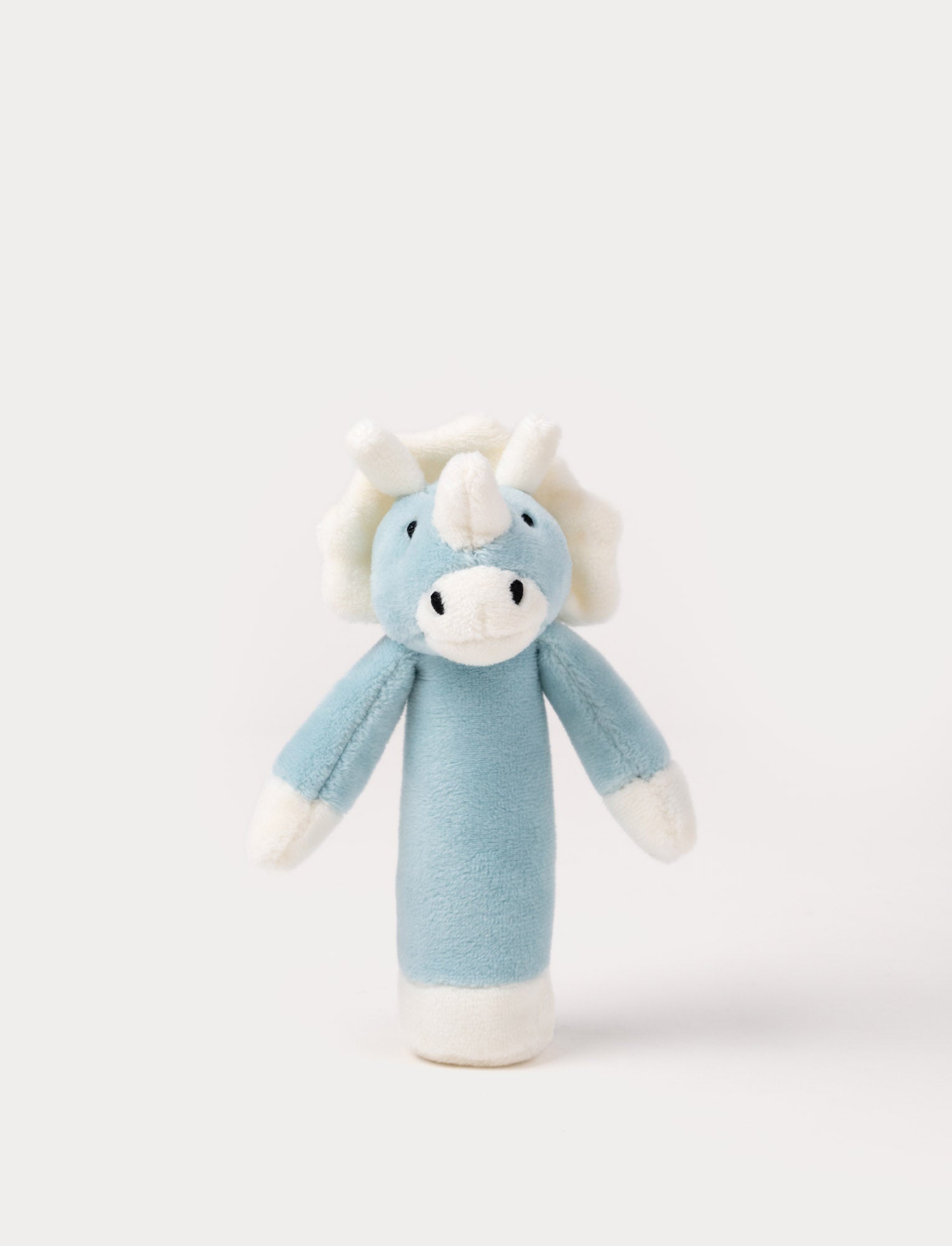  Image of Soft plush triceratops rattle with a blue body, white horns, a frilled crest, and embroidered eyes.