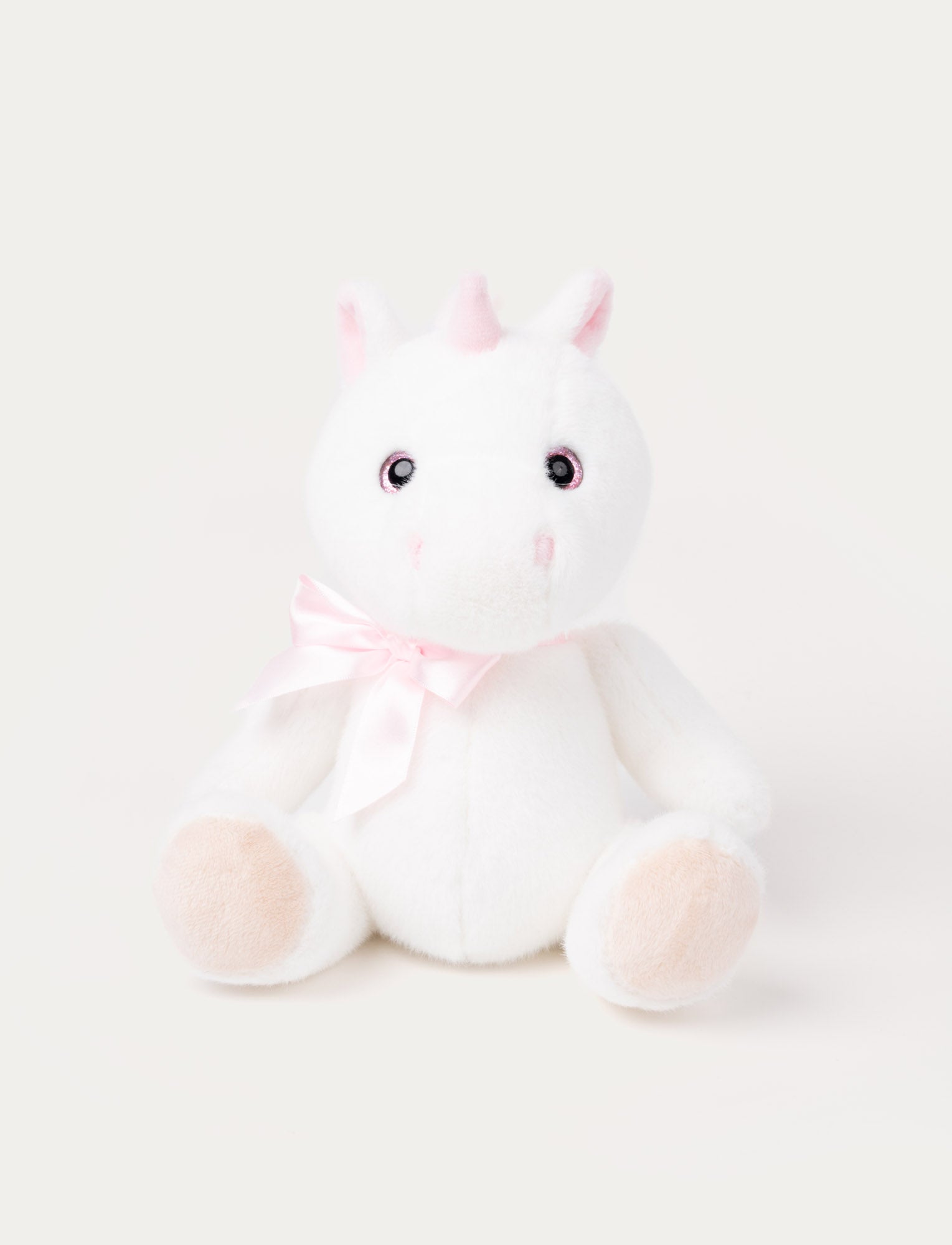  Image of A white unicorn with a satin bow, sparkling eyes, fluffy ears, and silky, cashmere-like fur.