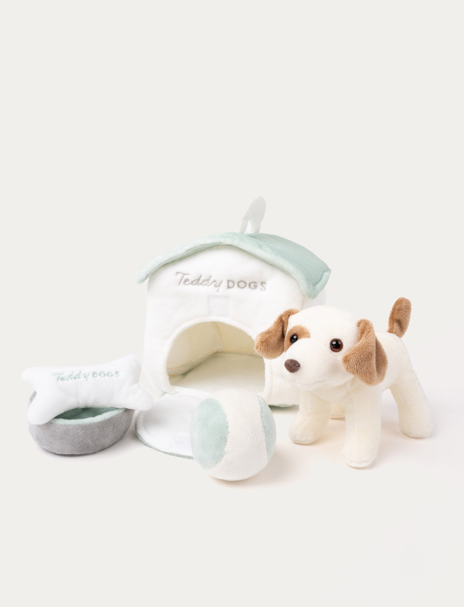  Image of A plush dog with a doghouse, dog bone, water bowl, and ball, perfect for imaginative play.