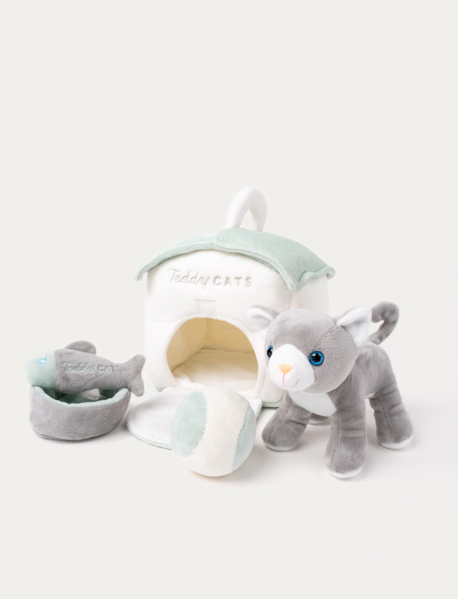  Image of A plush kitten with a cat house, fishbone toy, water bowl, and ball, perfect for imaginative play.