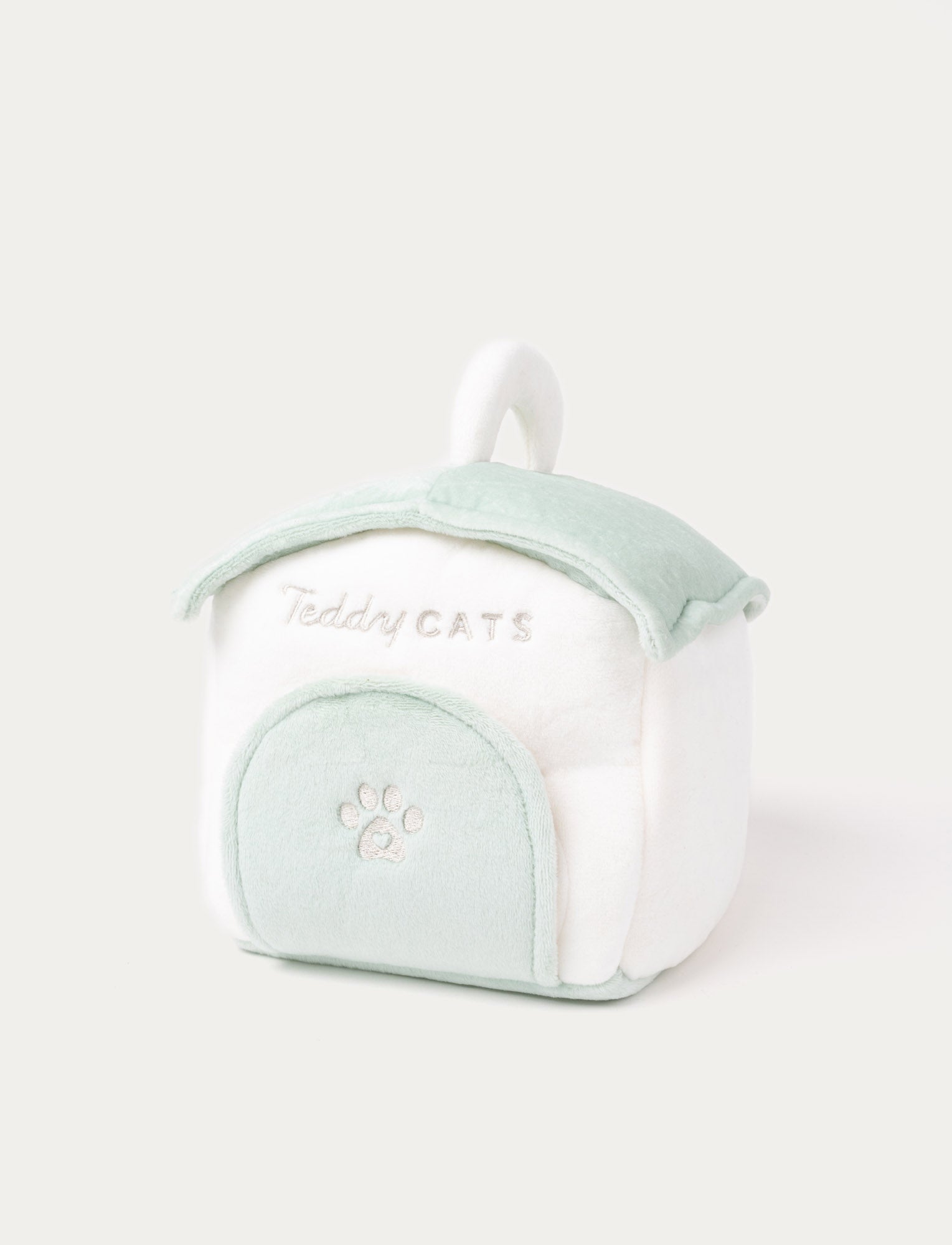  Image of A plush kitten with a cat house, fishbone toy, water bowl, and ball, perfect for imaginative play.