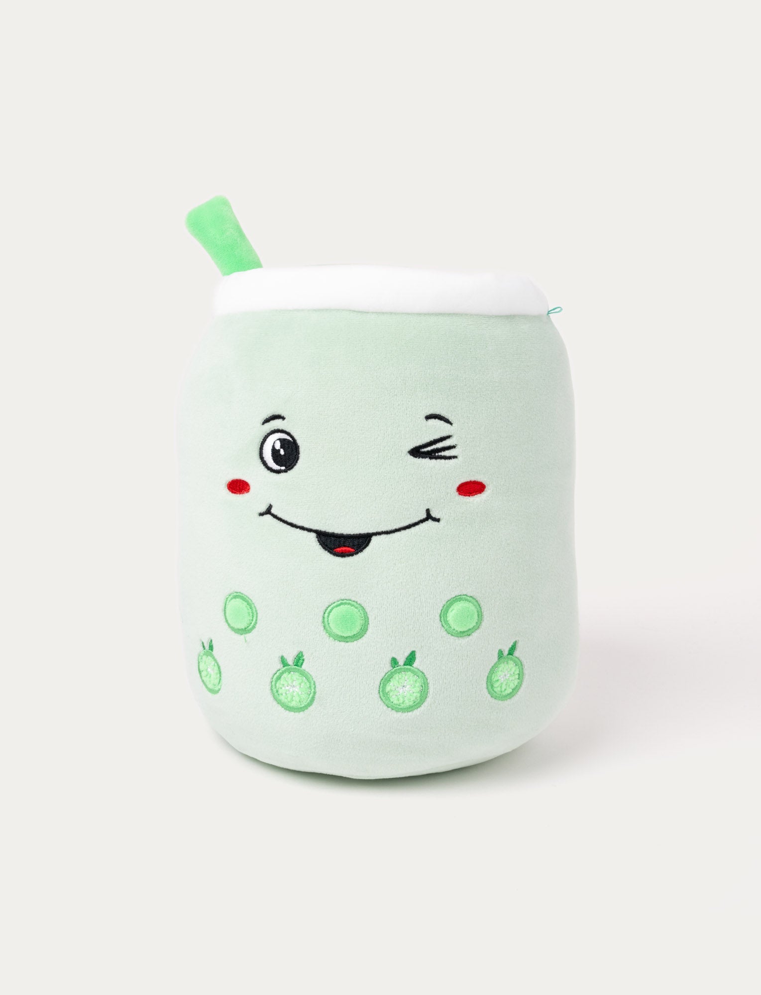  Image of Light green plush in the shape of a bubble tea cup with a winking face and a straw.